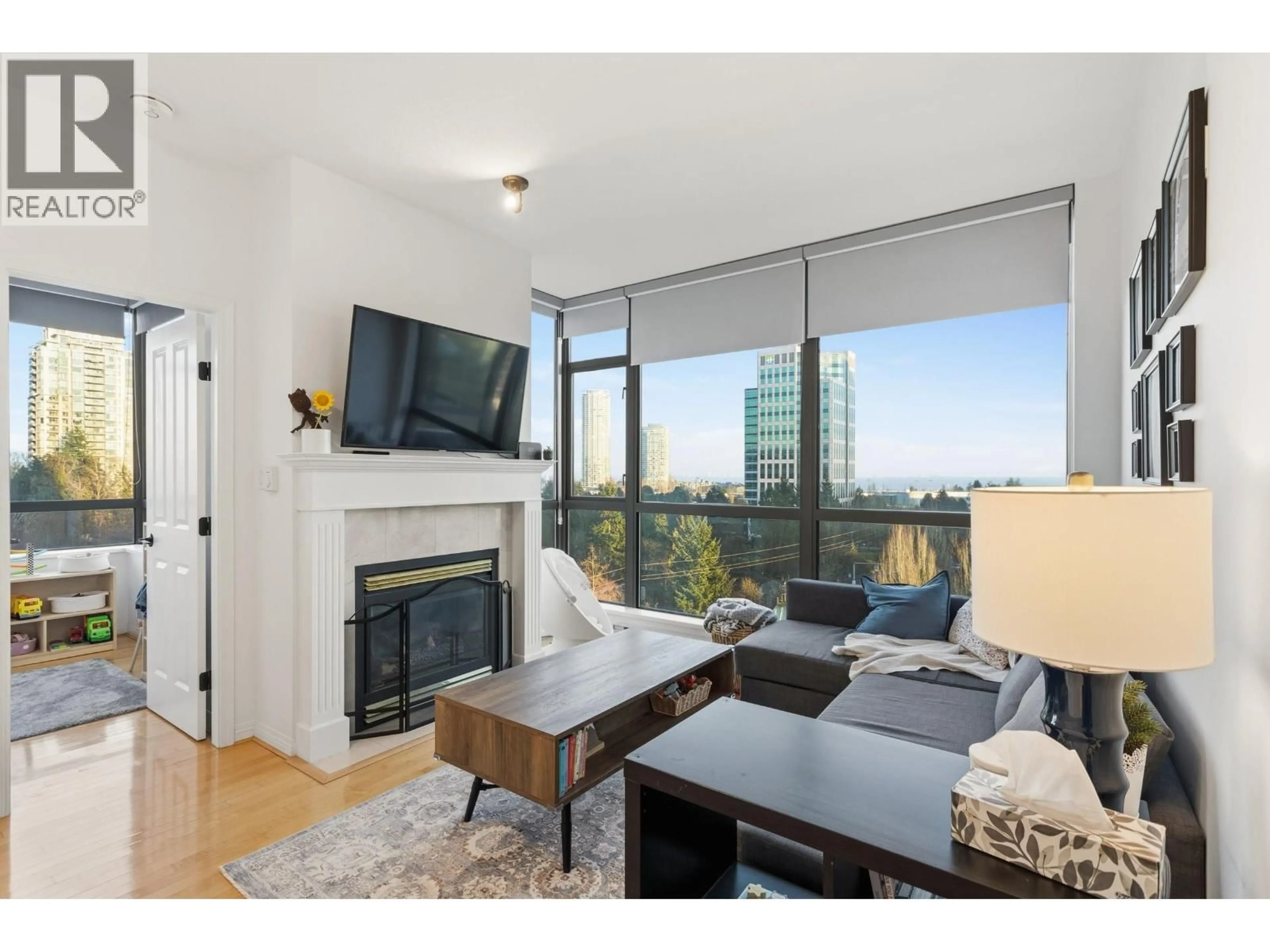 Living room with furniture, wood/laminate floor for 1003 - 6837 STATION HILL DRIVE, Burnaby British Columbia V3N5B7