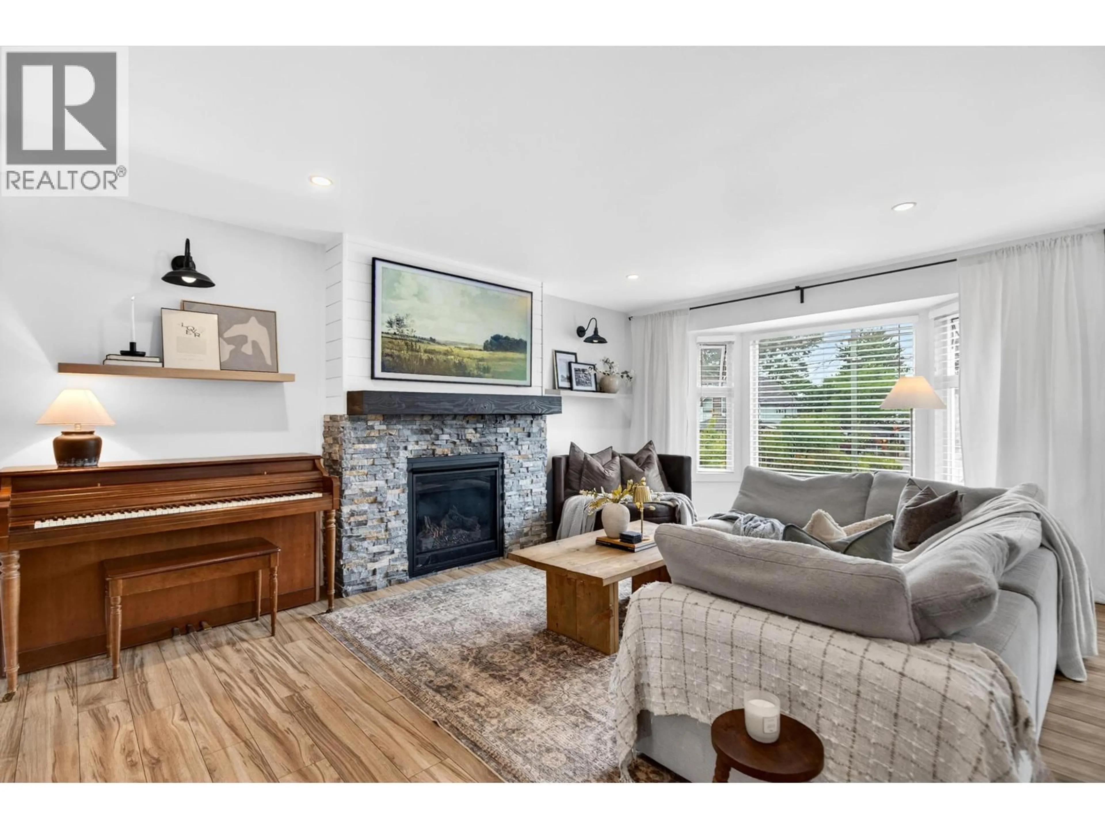 Living room with furniture, wood/laminate floor for 20280 OSPRING STREET, Maple Ridge British Columbia V2X1K4