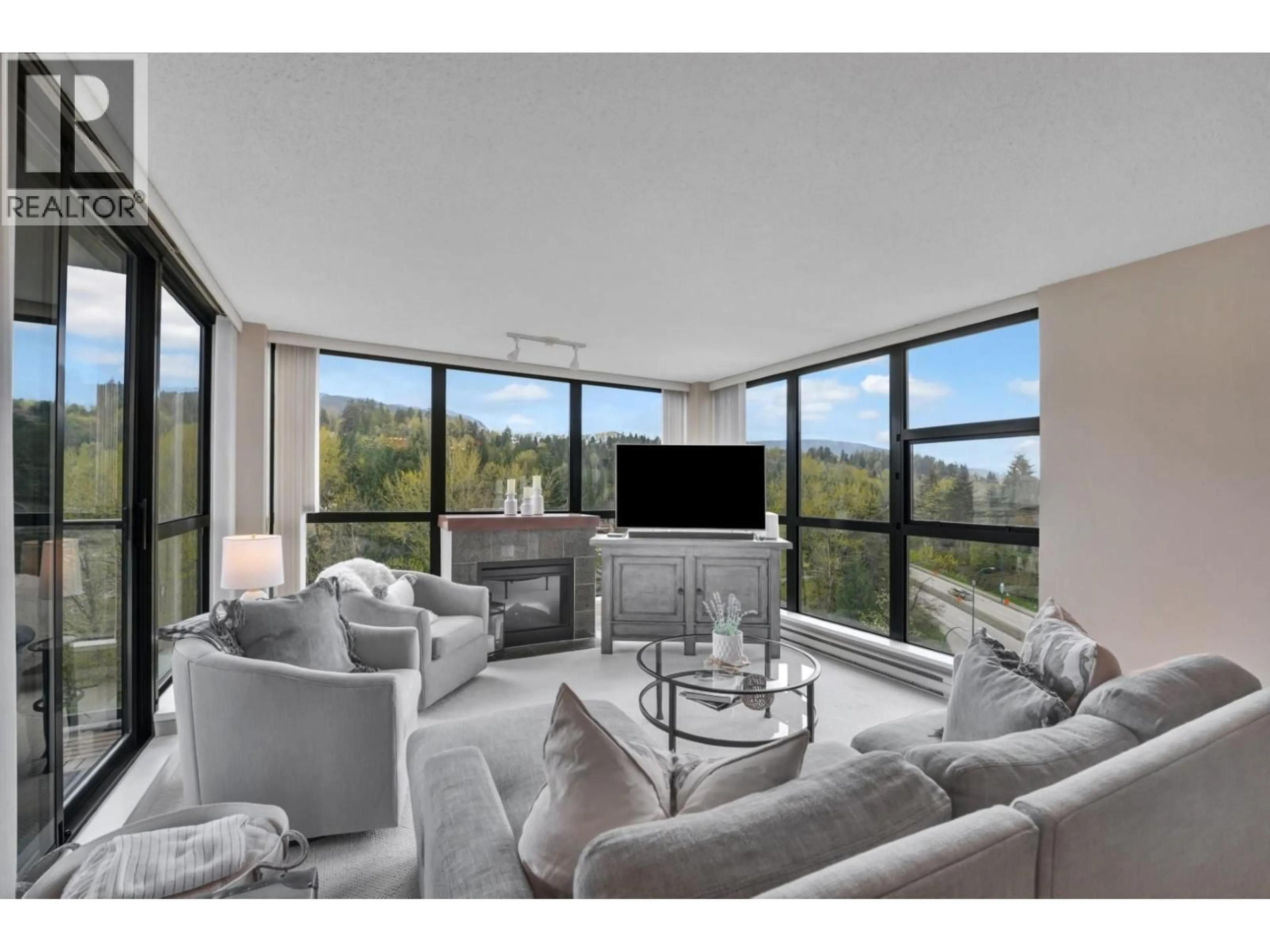 Living room with furniture, unknown for 1001 - 288 UNGLESS WAY, Port Moody British Columbia V3H0C9