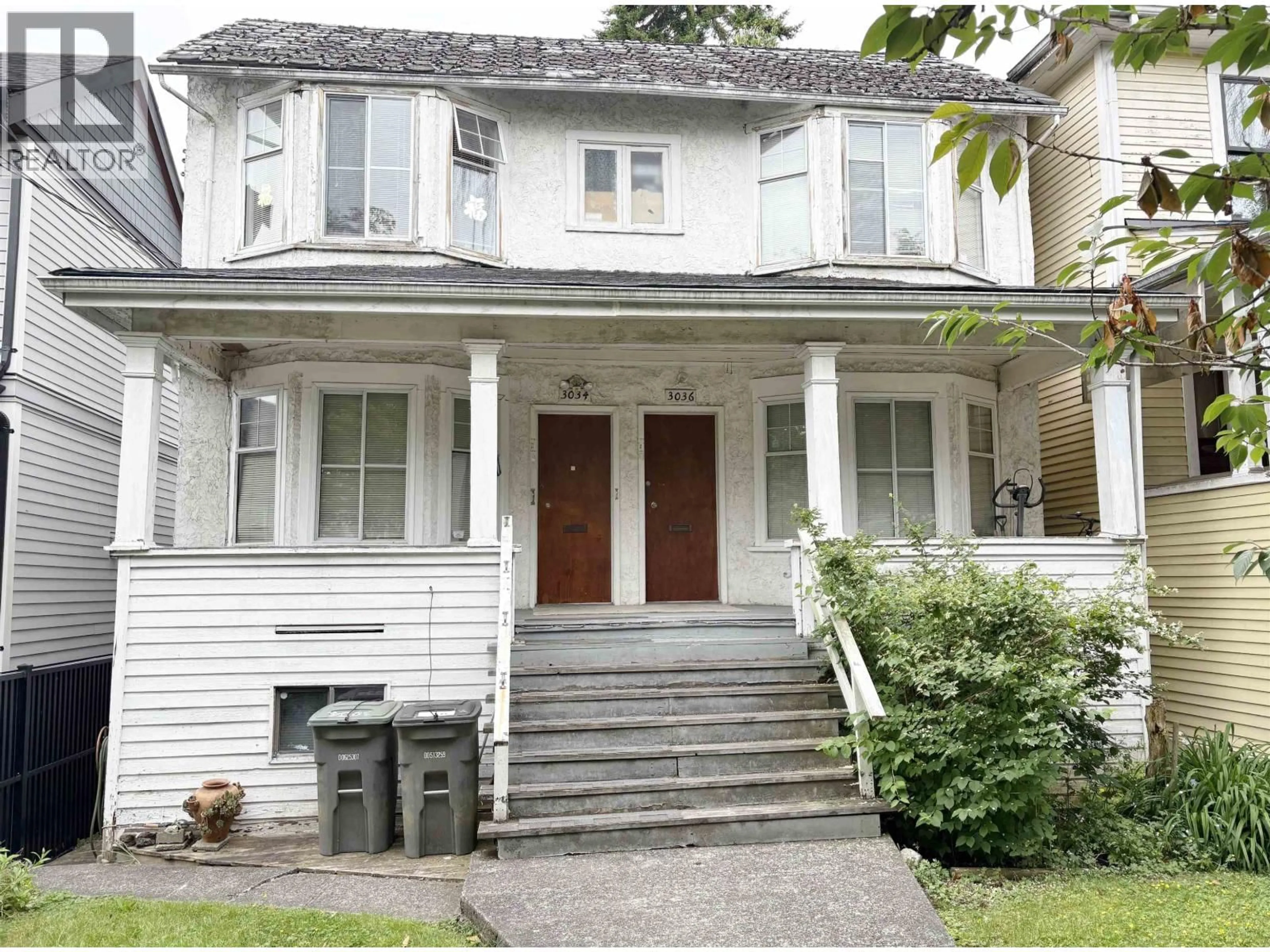 Home with vinyl exterior material, street for 3034 GLEN DRIVE, Vancouver British Columbia V5T4C1