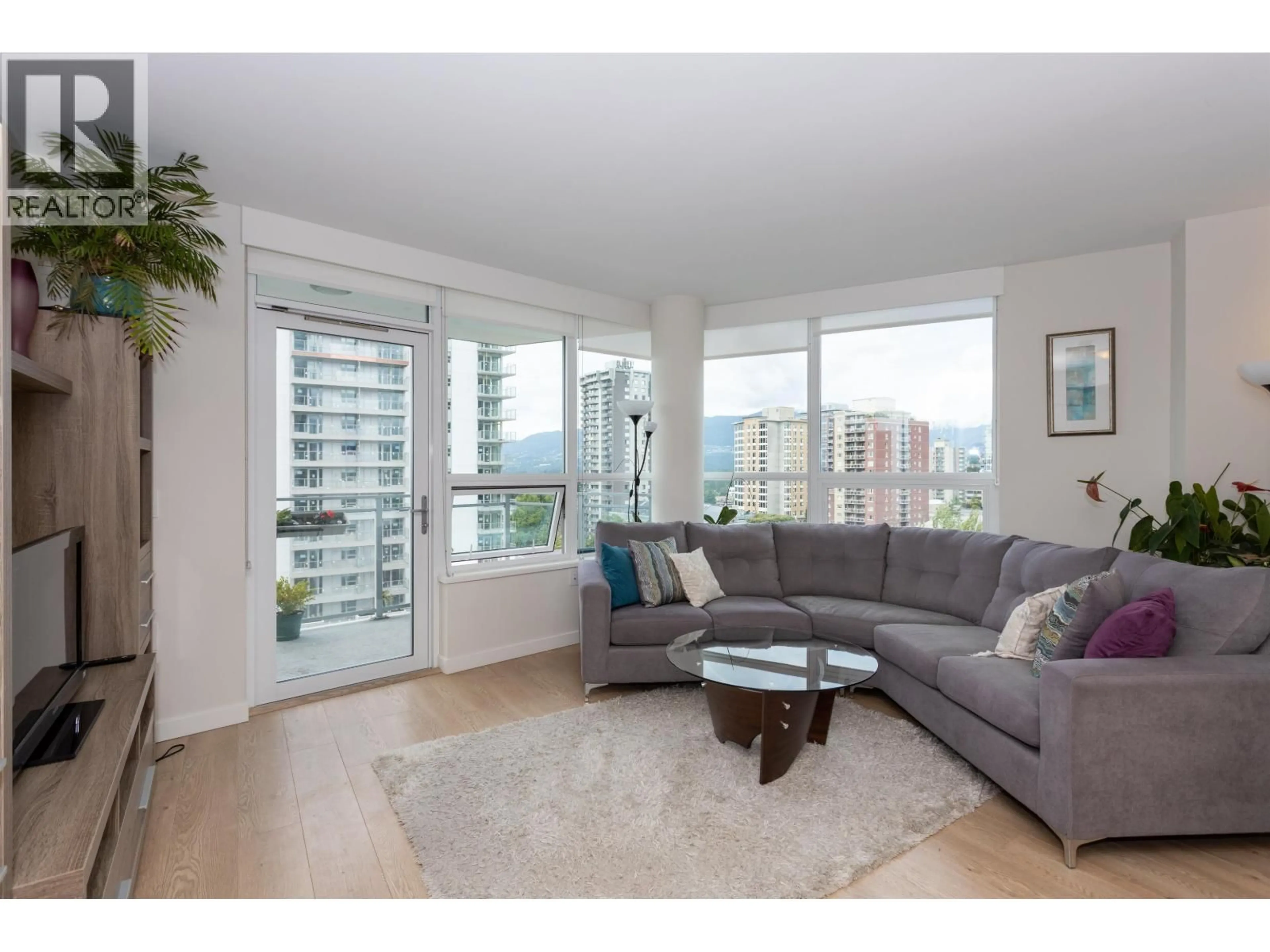 Living room with furniture, unknown for 707 - 112 13TH STREET, North Vancouver British Columbia V7L0E4