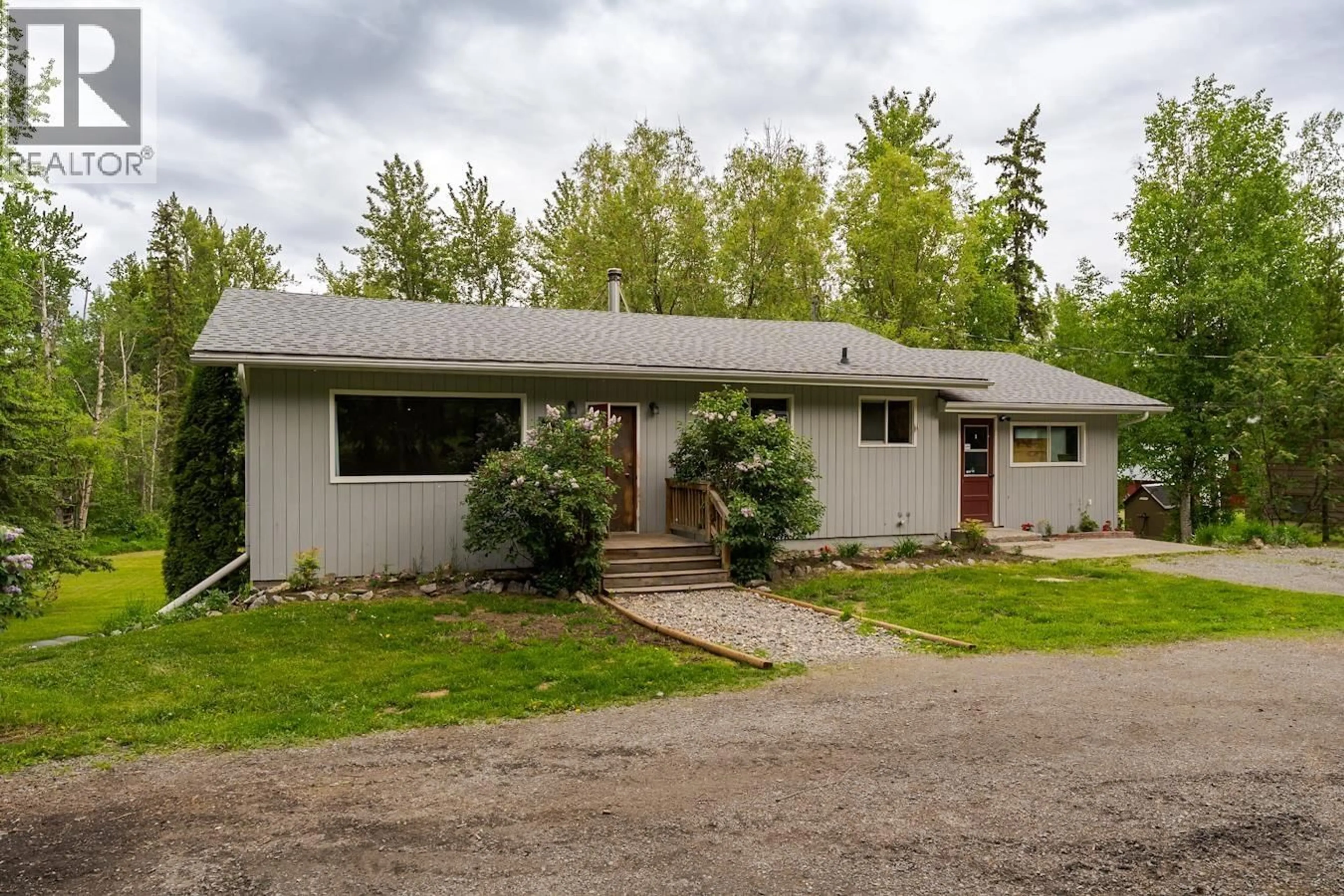 Home with vinyl exterior material, street for 9744 HALDI ROAD, Prince George British Columbia V2N6J5