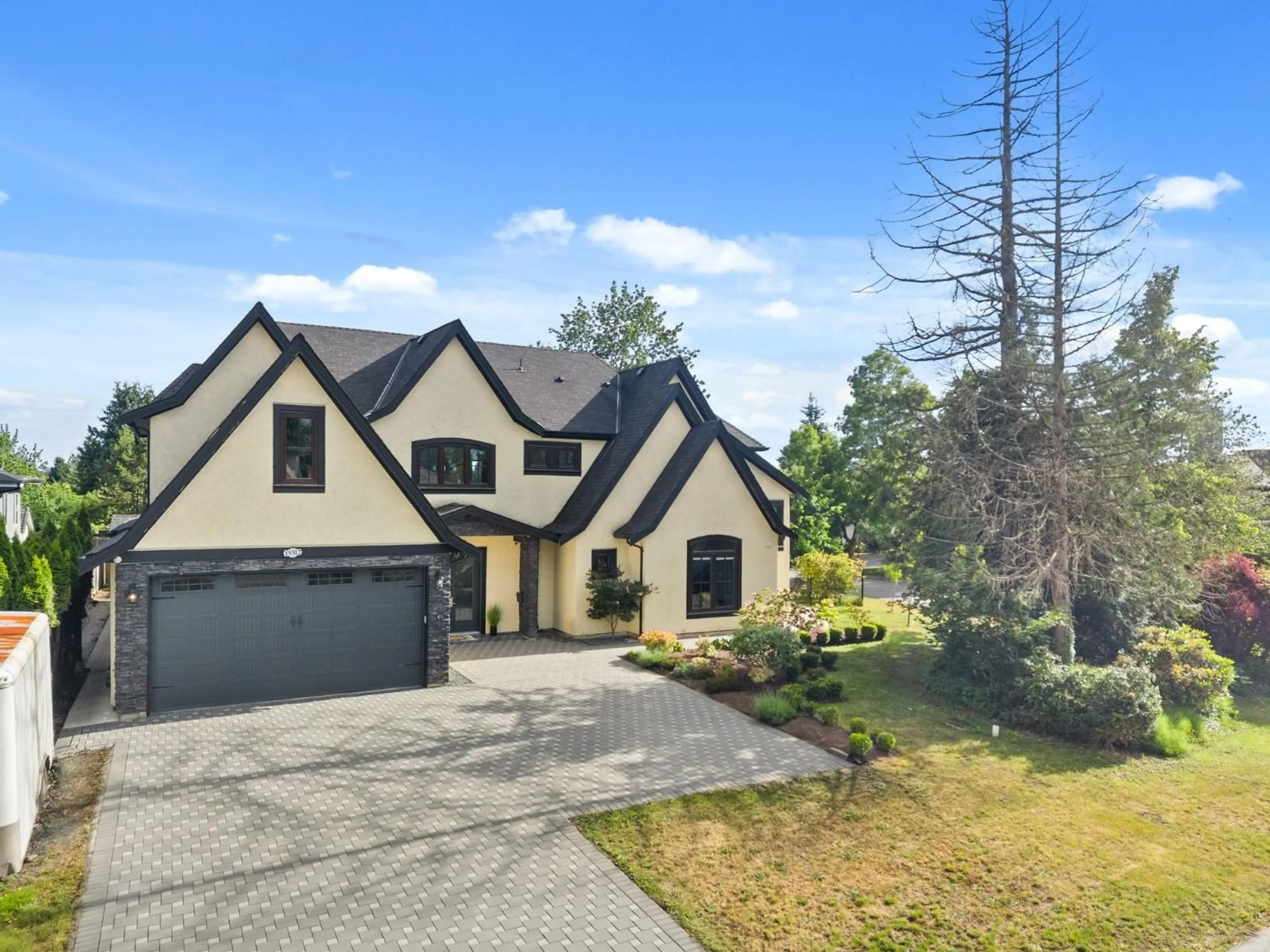 Home with brick exterior material, street for 15512 109 AVENUE, Surrey British Columbia V3R7E8