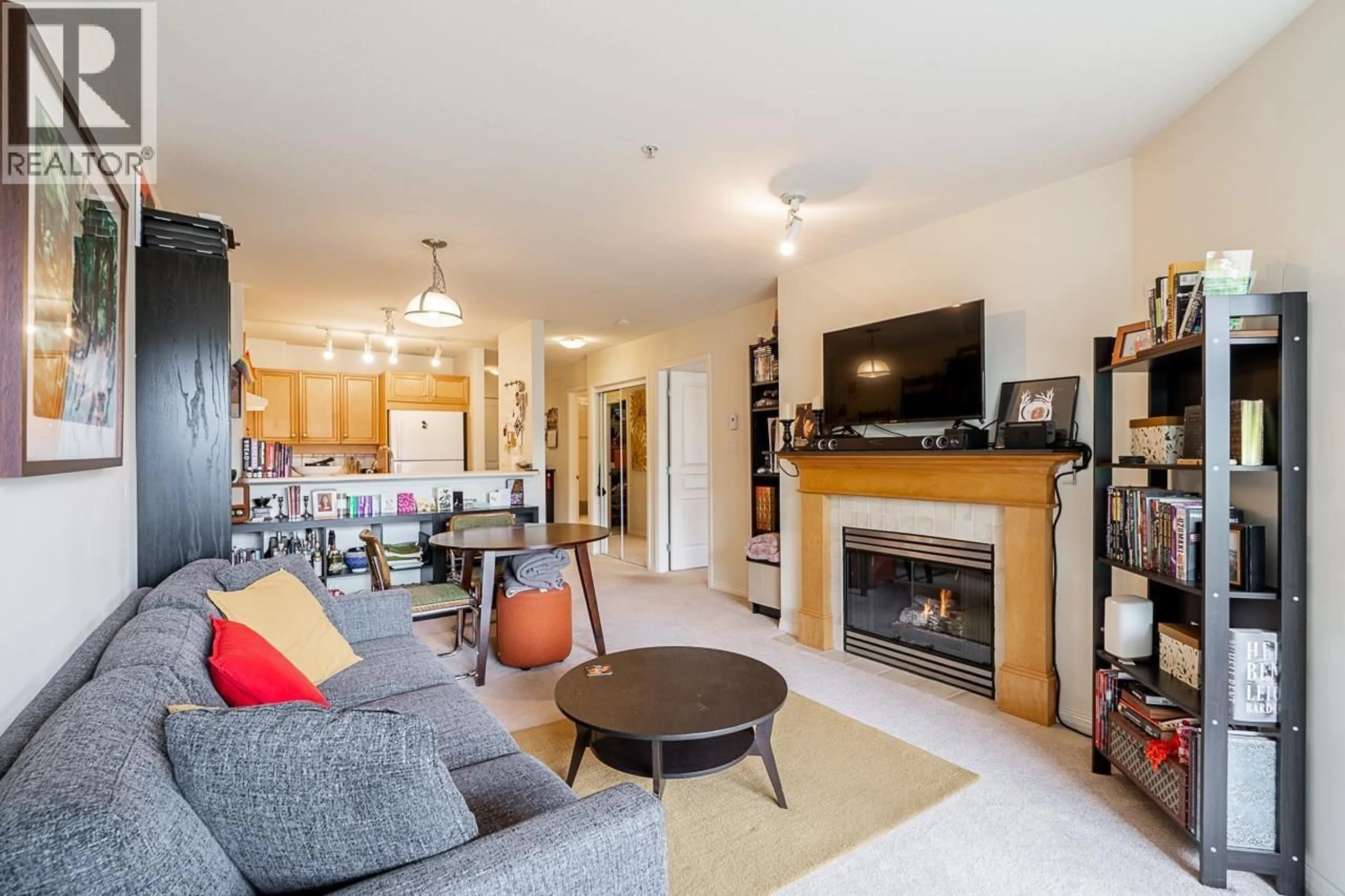 Living room with furniture, wood/laminate floor for 306 - 2929 4TH AVENUE, Vancouver British Columbia V6K4T3