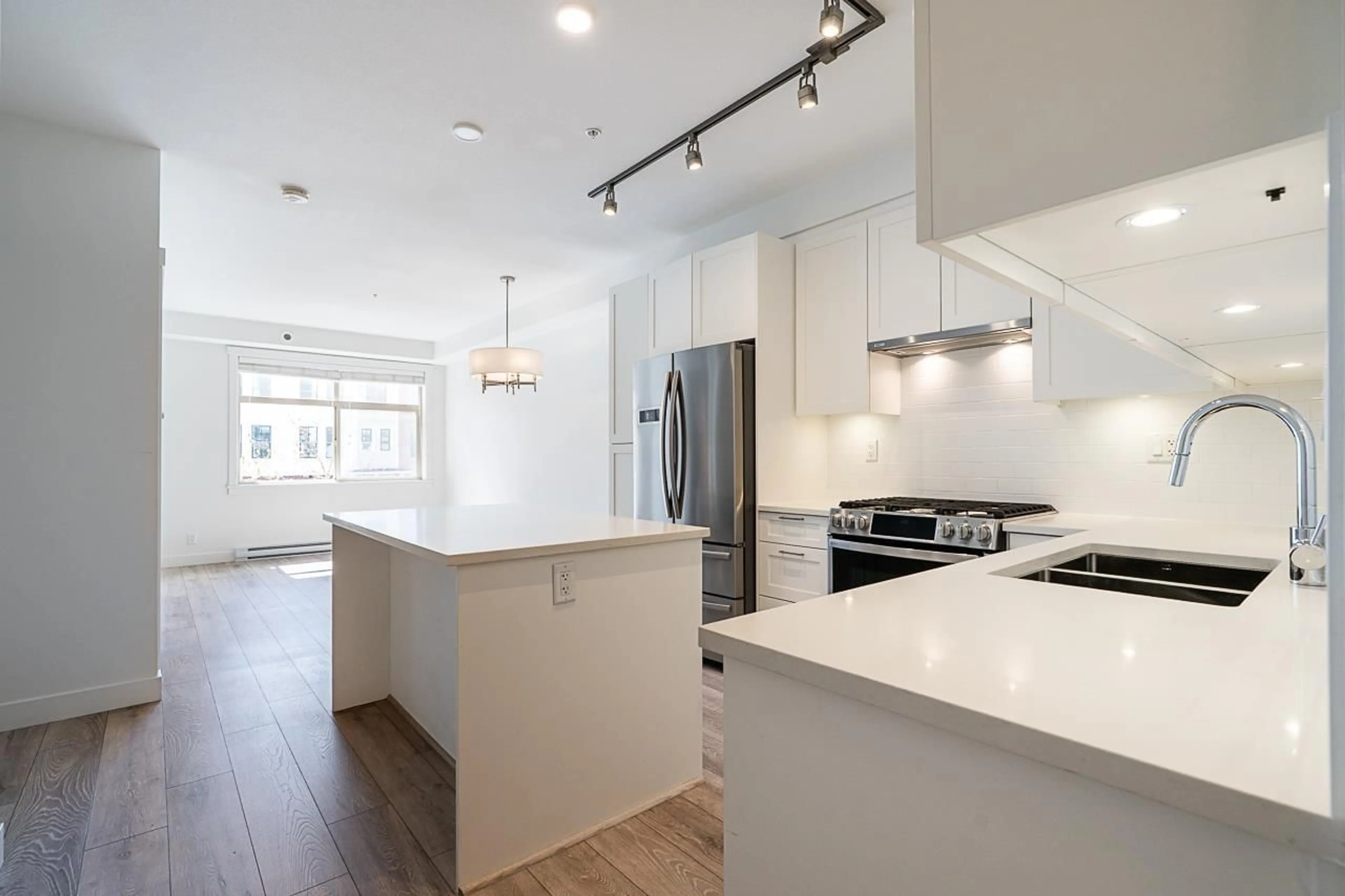 Open concept kitchen, unknown for 205 - 20673 78 AVENUE, Langley British Columbia V2Y3K1