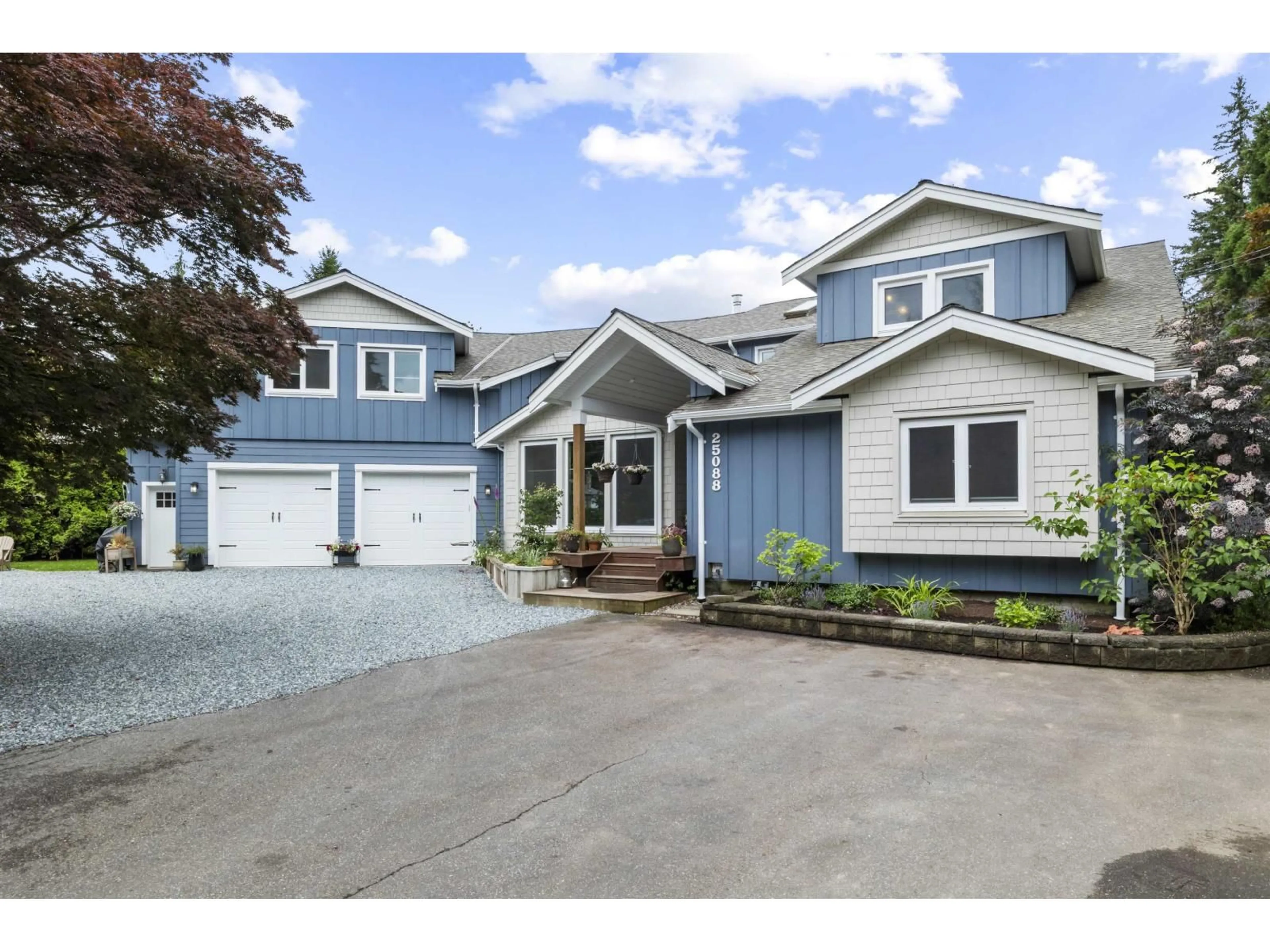 Home with vinyl exterior material, street for 25088 59 AVENUE, Langley British Columbia V4W1T4