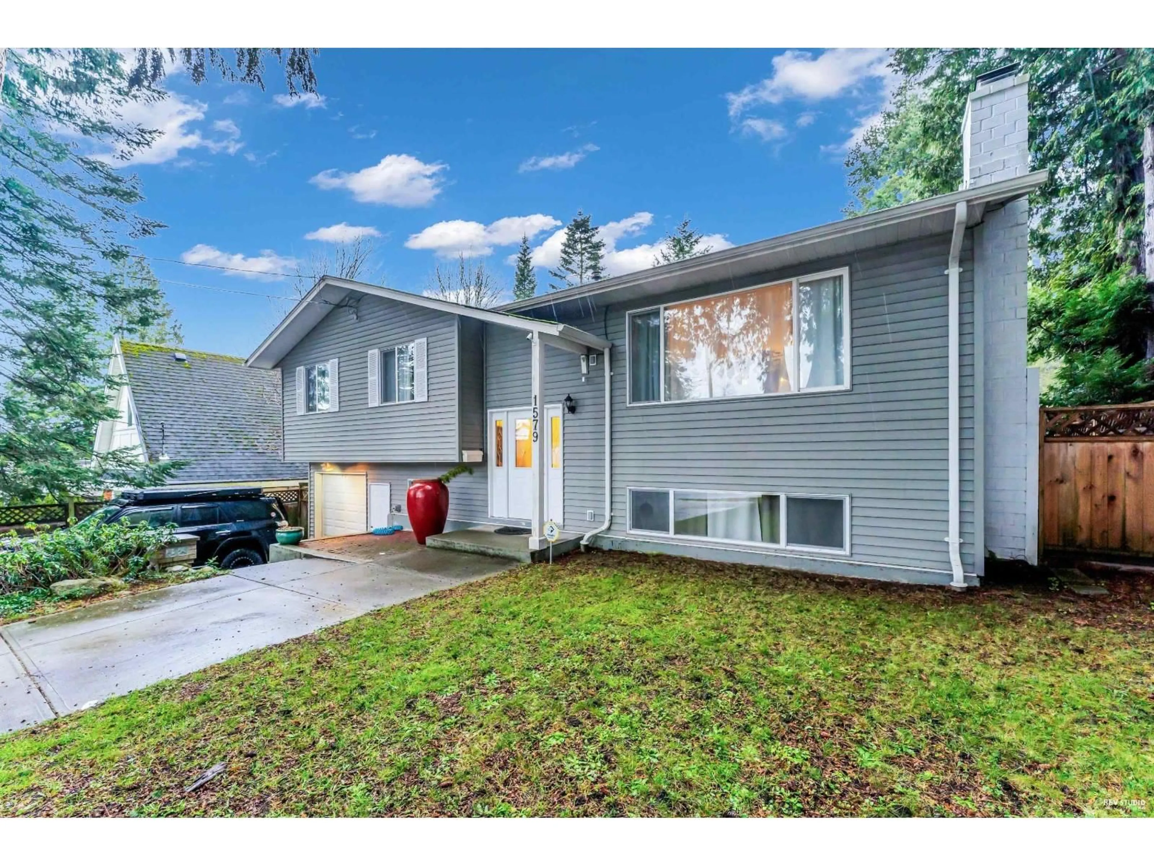 Home with vinyl exterior material, street for 1579 136 STREET, Surrey British Columbia V4A5H3