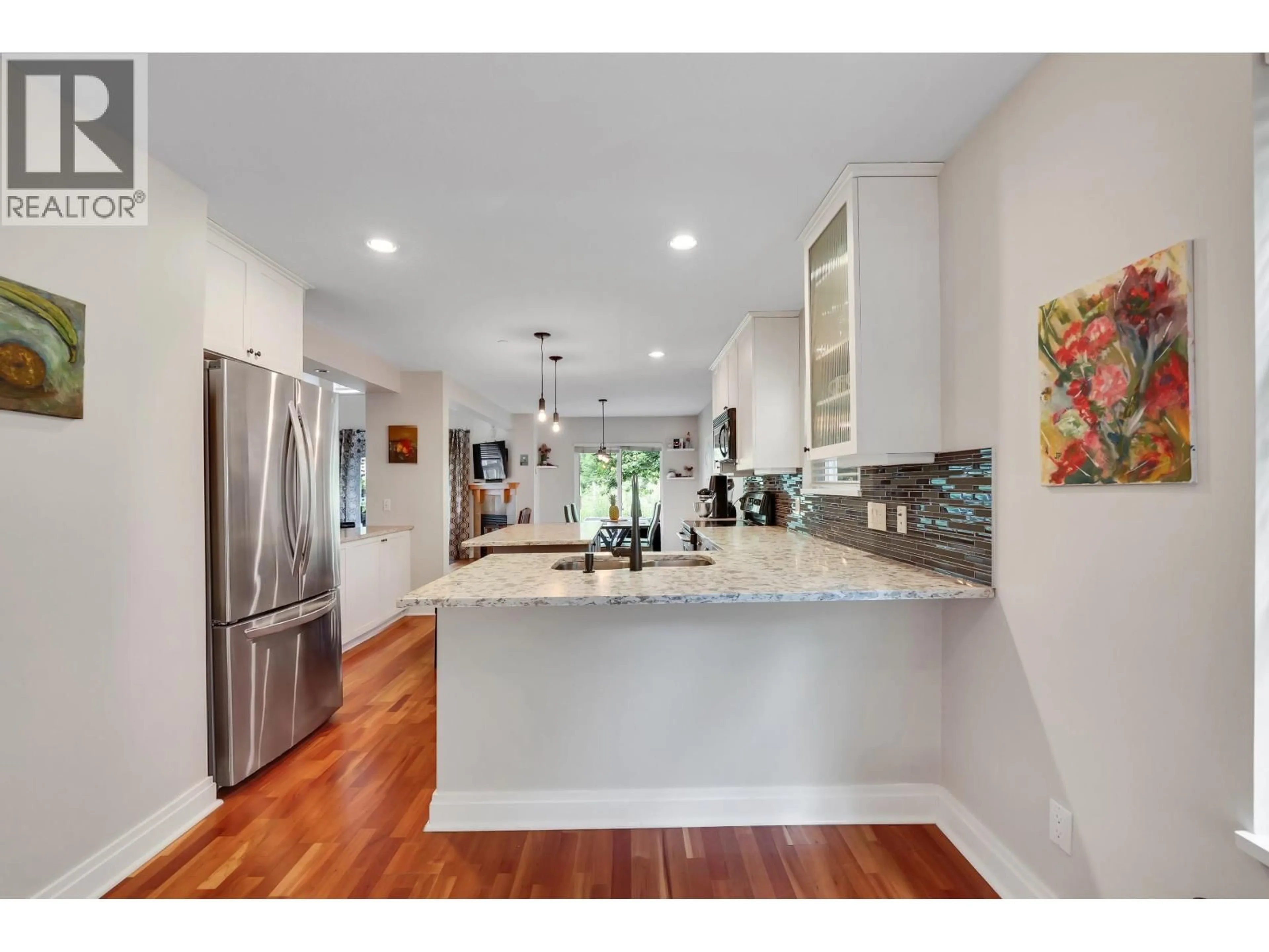 Open concept kitchen, ceramic/tile floor for 53 - 41050 TANTALUS ROAD, Squamish British Columbia V8E0M6