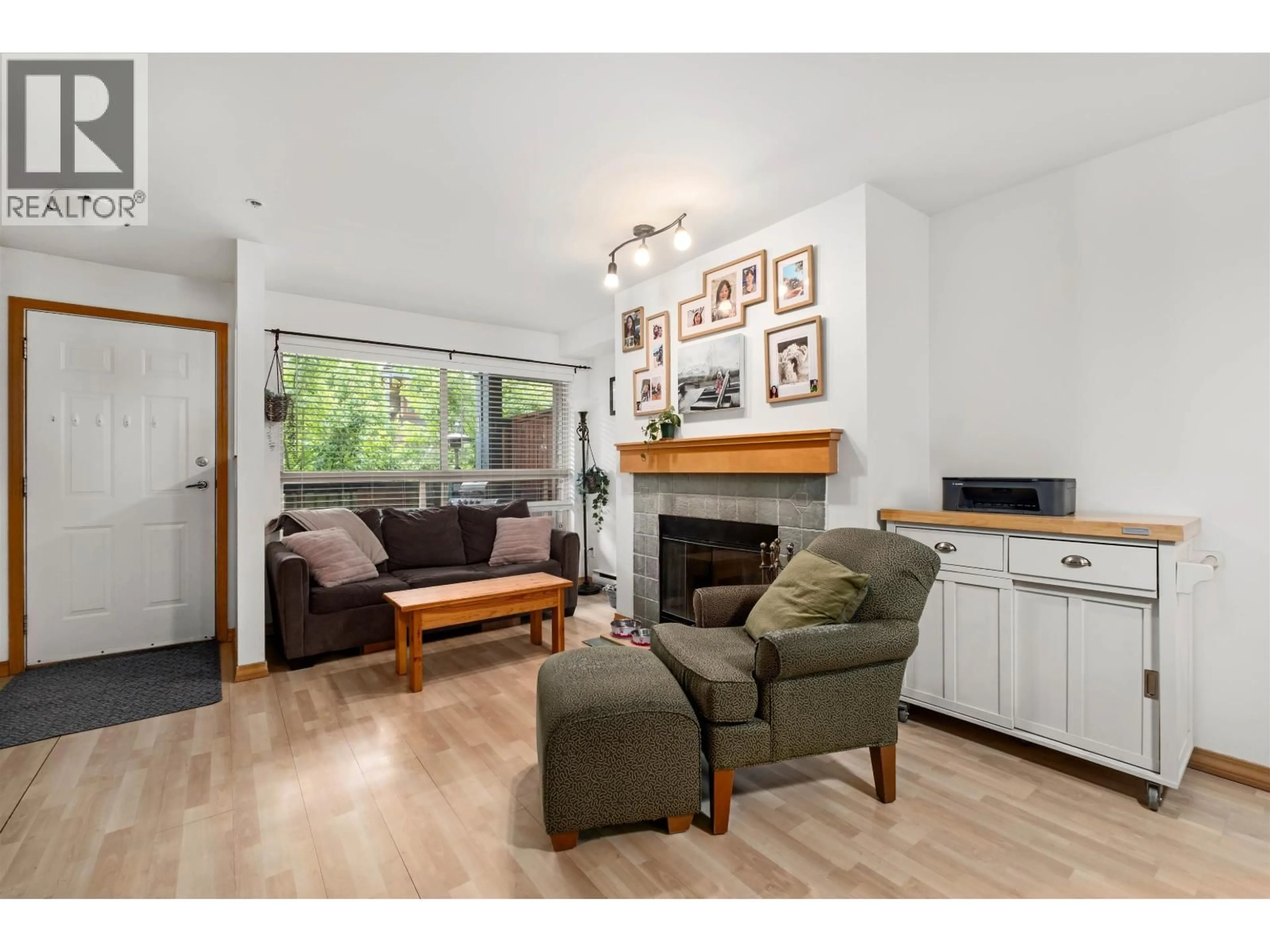 Living room with furniture, wood/laminate floor for 39 - 7410 FLINT STREET, Pemberton British Columbia V0N2L1