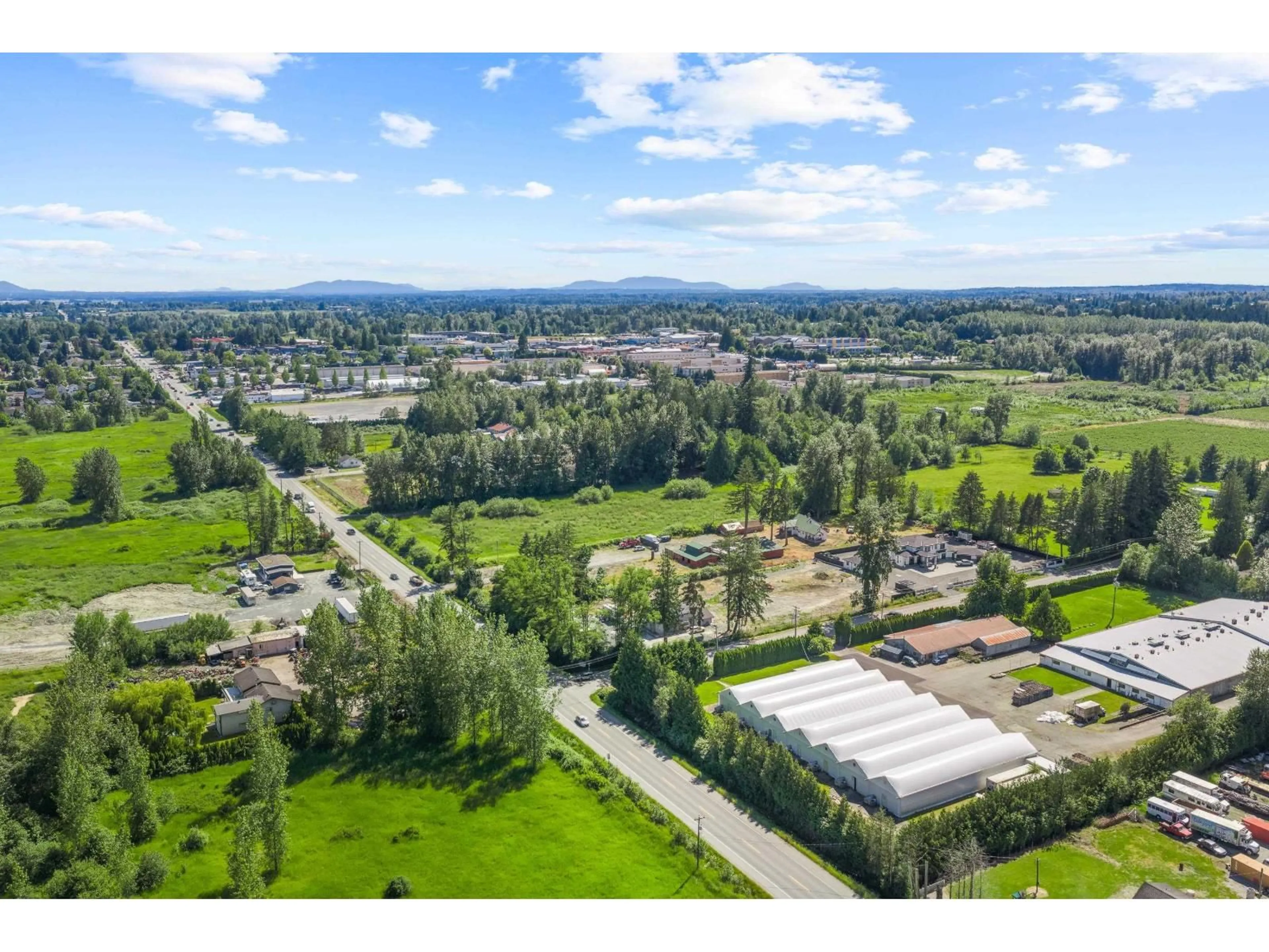 A pic from outside/outdoor area/front of a property/back of a property/a pic from drone, mountain view for 3555 264 STREET, Langley British Columbia V4W2X3
