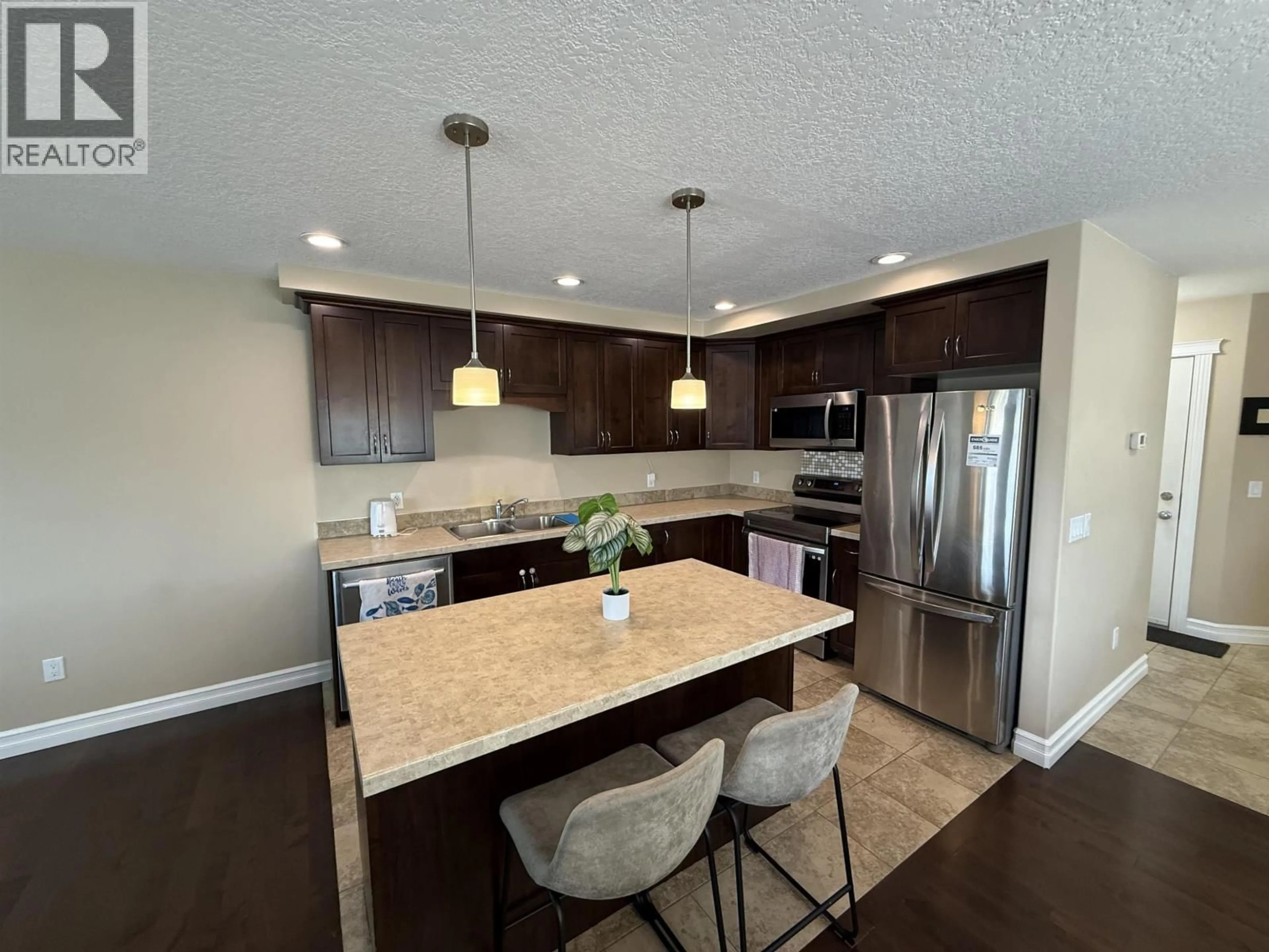 Open concept kitchen, unknown for 10420 109 STREET, Fort St. John British Columbia V1J0J3