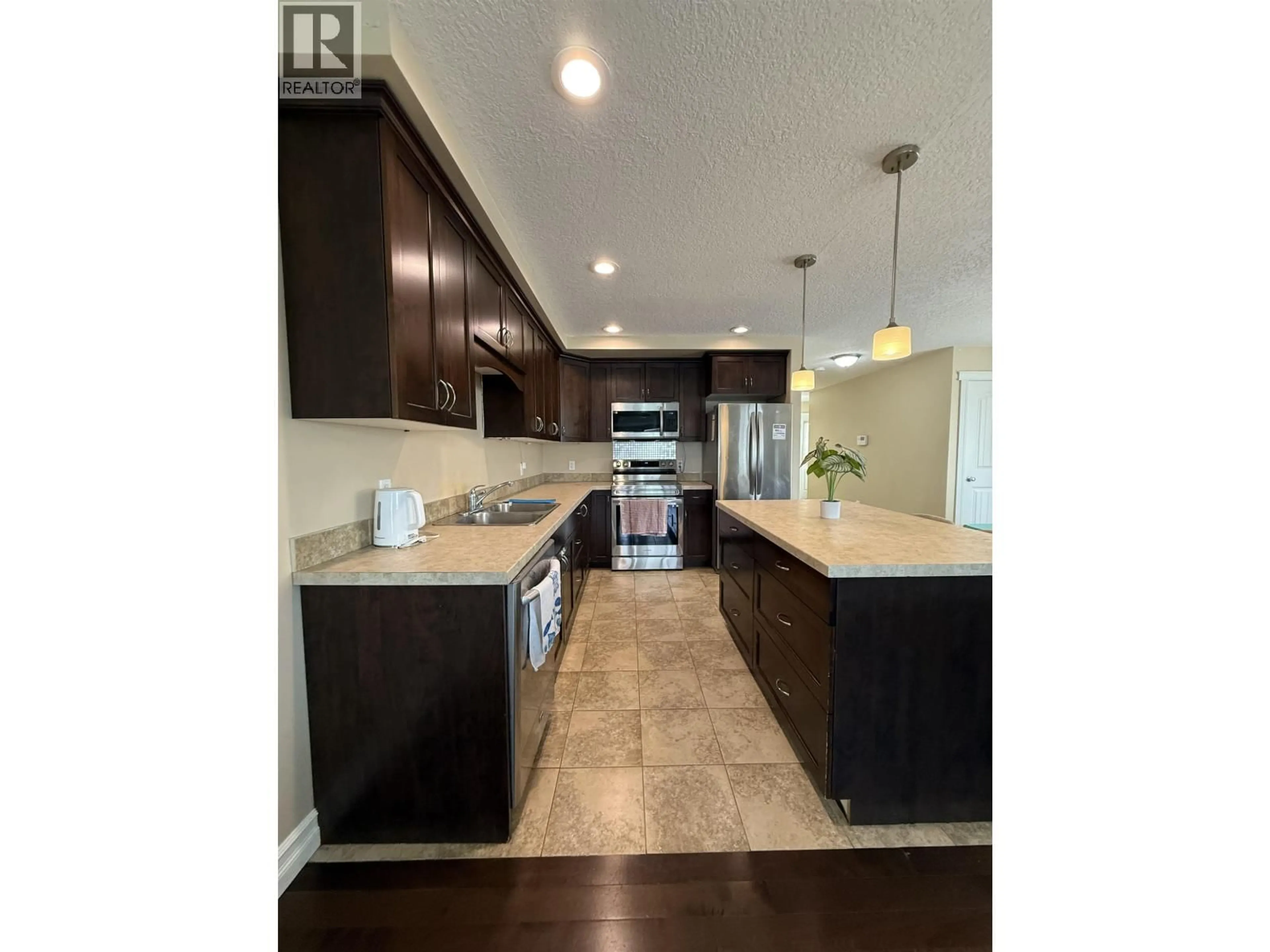 Open concept kitchen, unknown for 10420 109 STREET, Fort St. John British Columbia V1J0J3