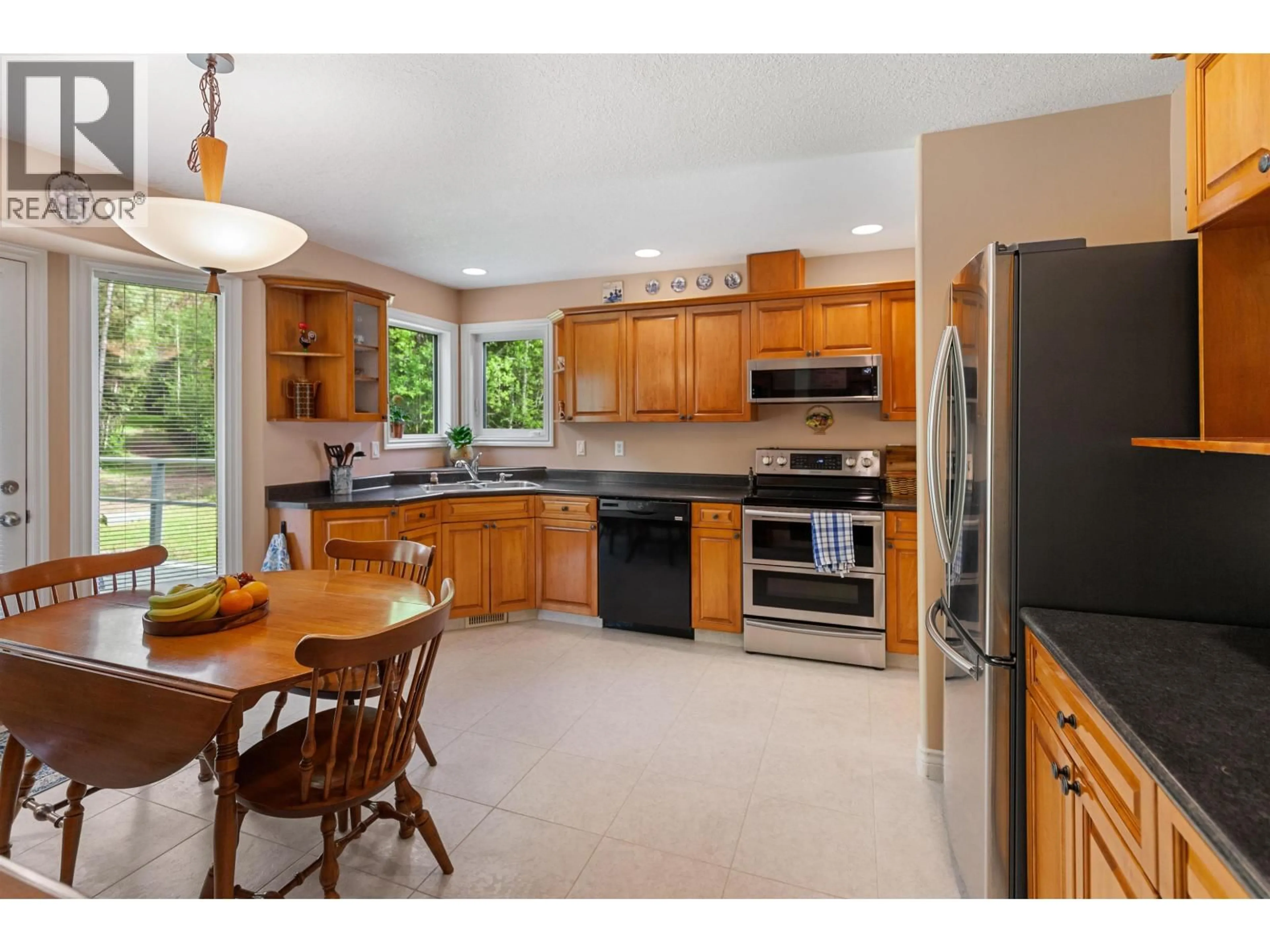 Open concept kitchen, ceramic/tile floor for 10020 TREBE ROAD, Prince George British Columbia V2N5B4