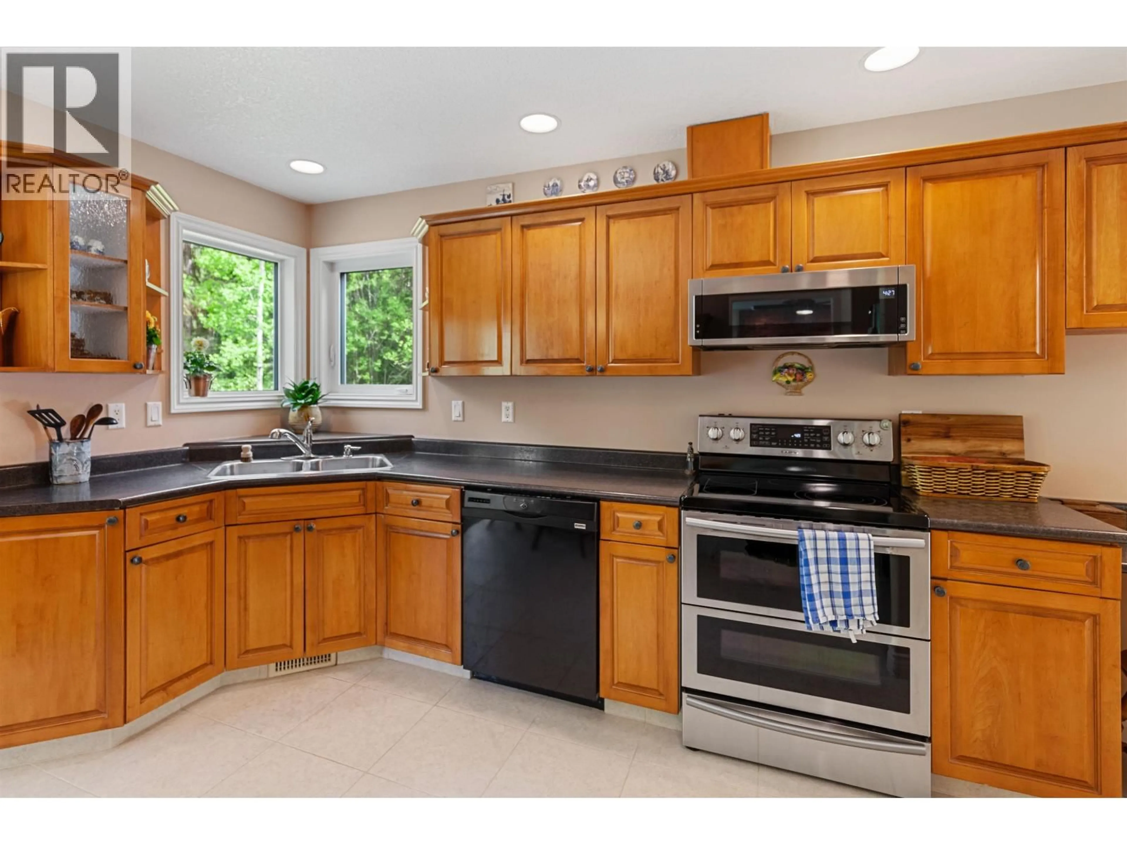 Standard kitchen, ceramic/tile floor for 10020 TREBE ROAD, Prince George British Columbia V2N5B4