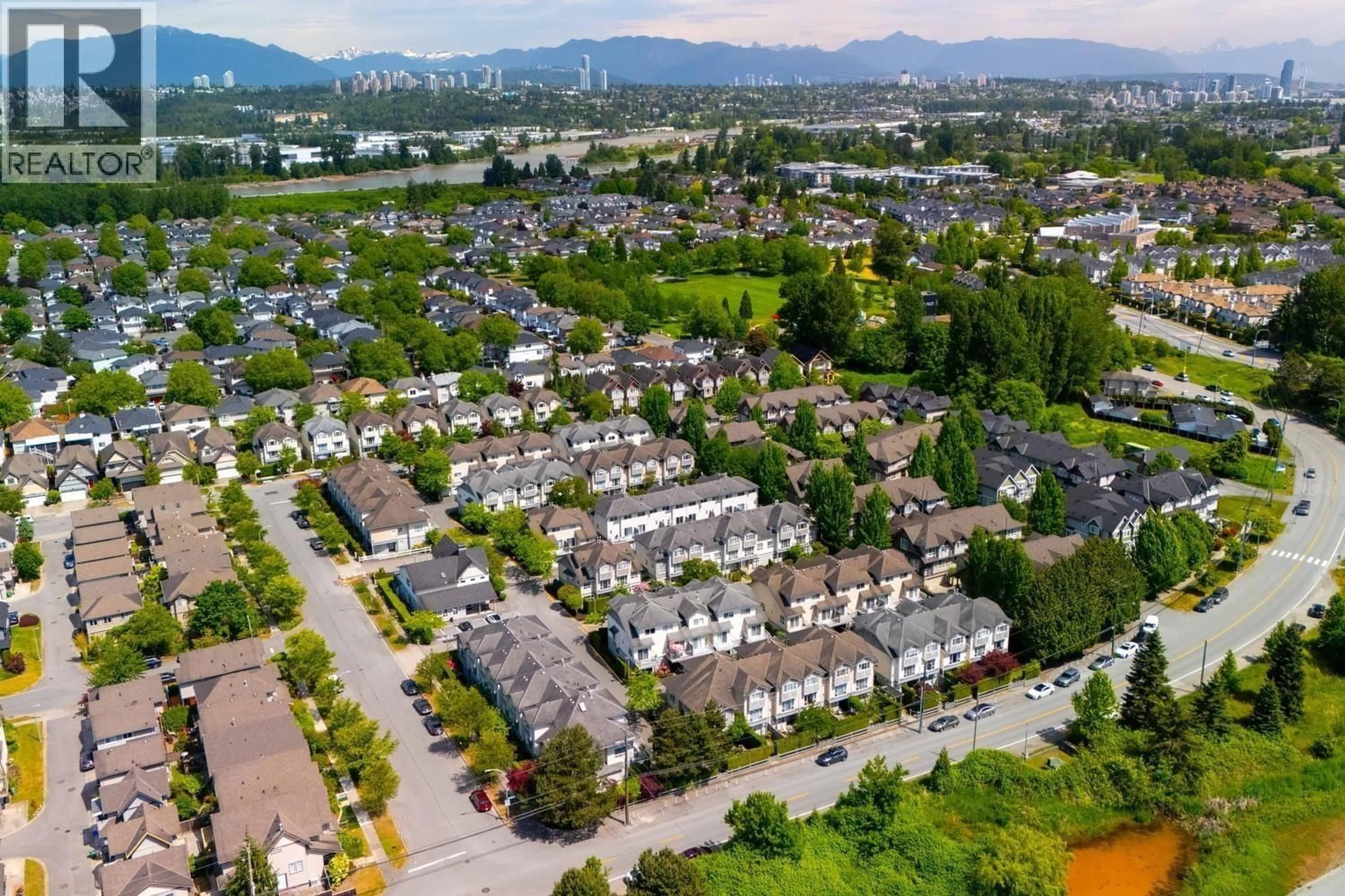 A pic from outside/outdoor area/front of a property/back of a property/a pic from drone, mountain view for 7 - 5900 MUIR DRIVE, Richmond British Columbia V6V2Y8