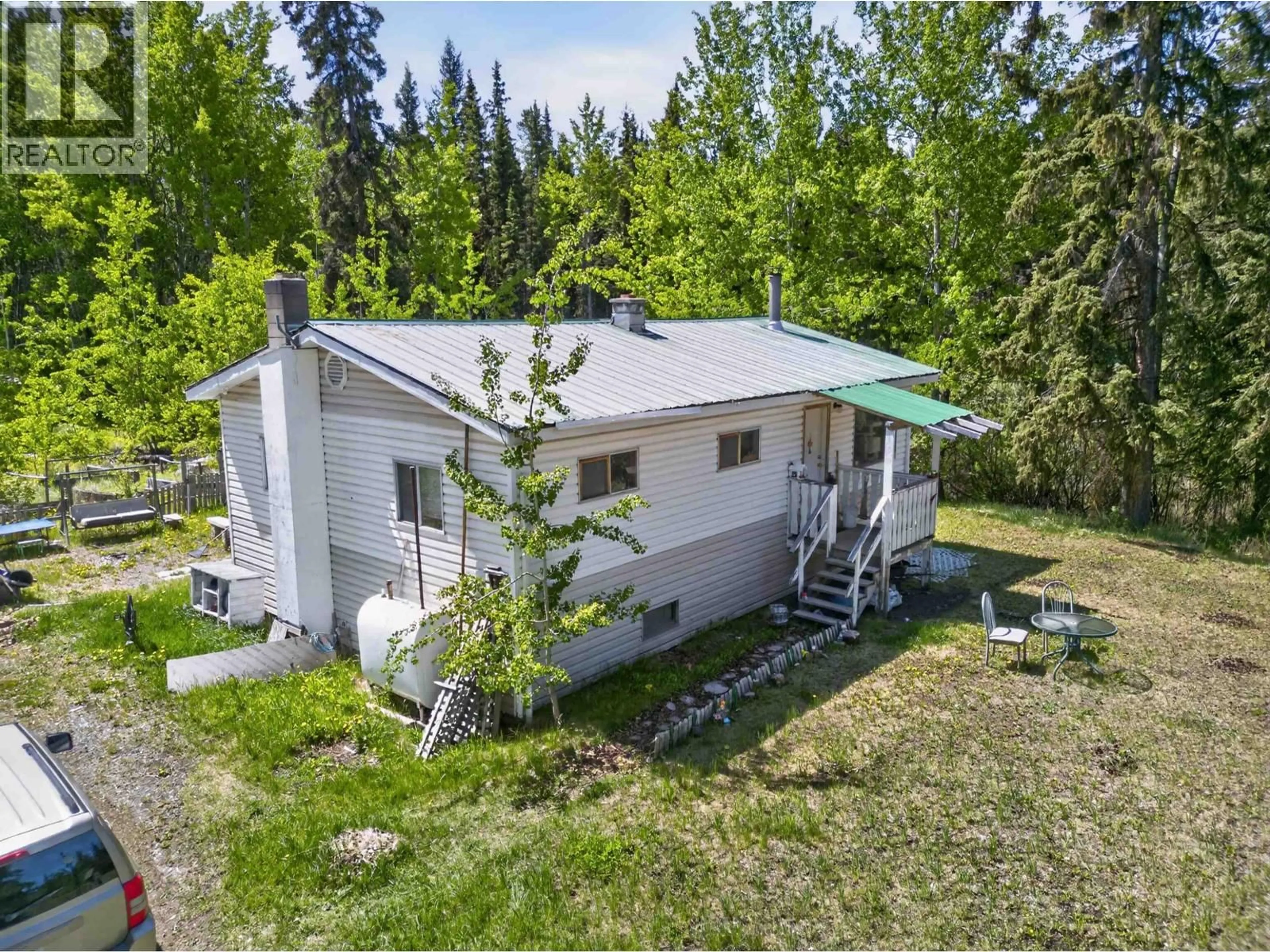 A pic from outside/outdoor area/front of a property/back of a property/a pic from drone, unknown for 6693 HYRA ROAD, 100 Mile House British Columbia V0K2E2