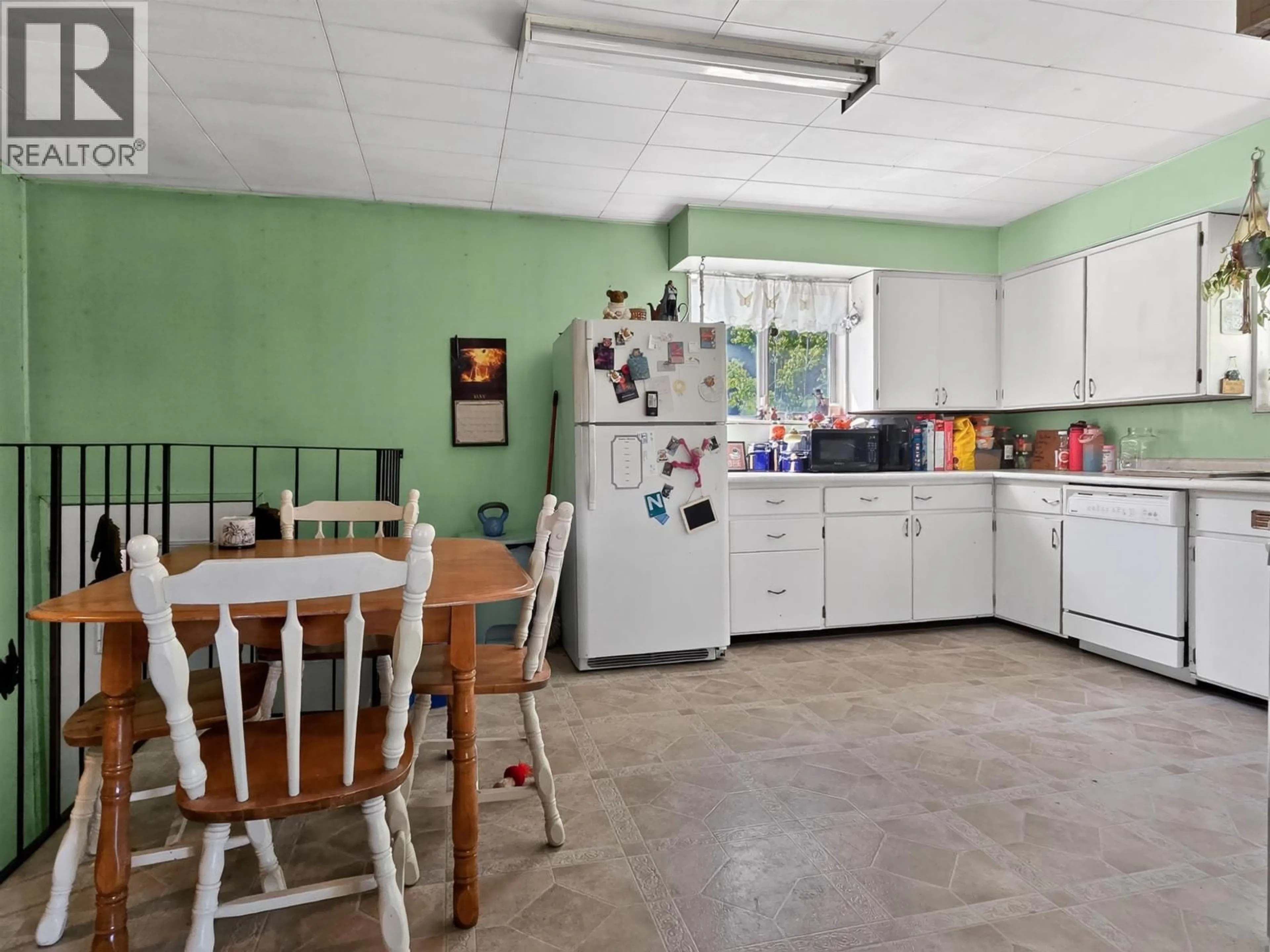 Standard kitchen, ceramic/tile floor for 6693 HYRA ROAD, 100 Mile House British Columbia V0K2E2
