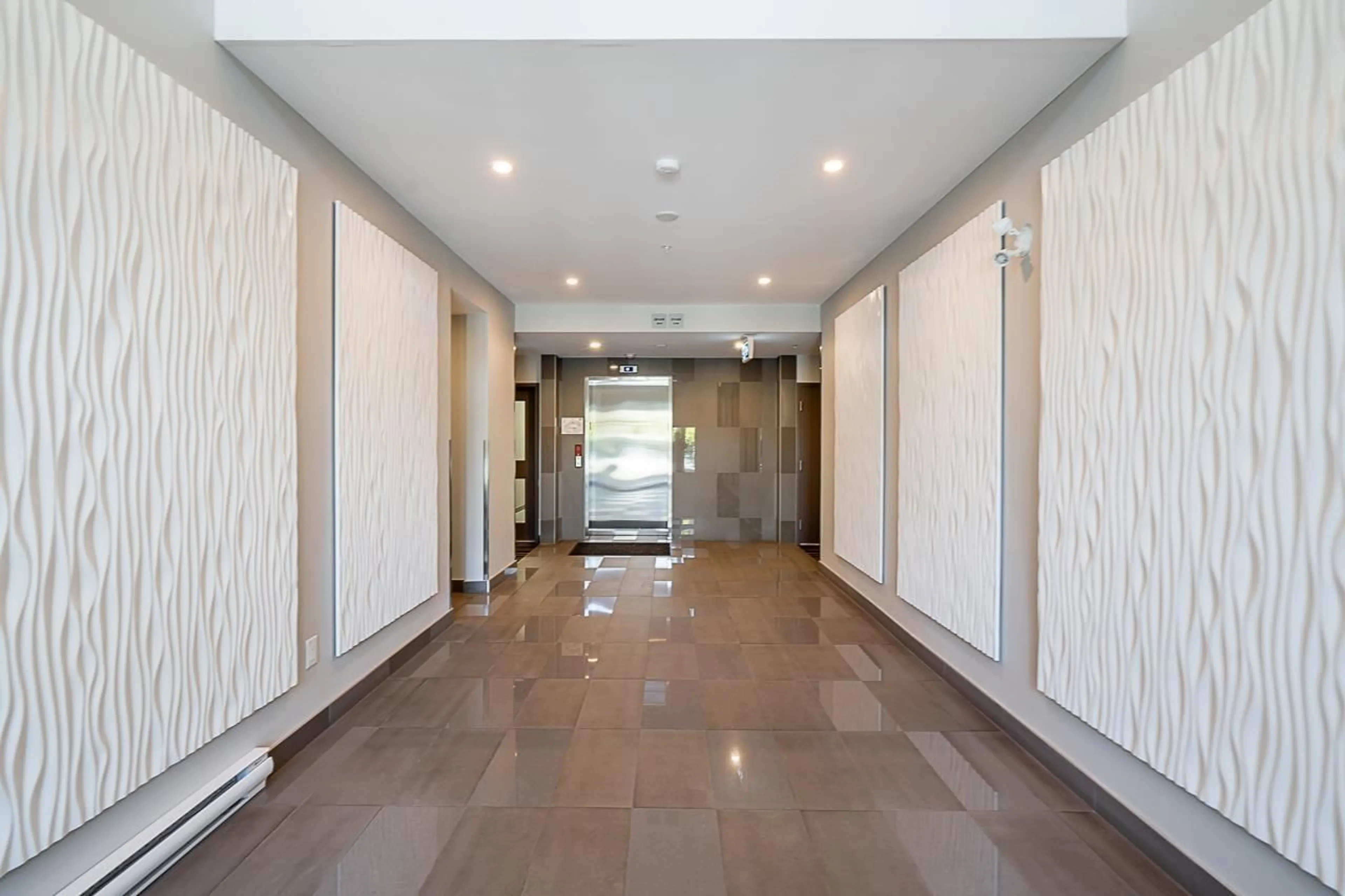 Indoor foyer for 108 - 15436 31 AVENUE, Surrey British Columbia V3Z1H3