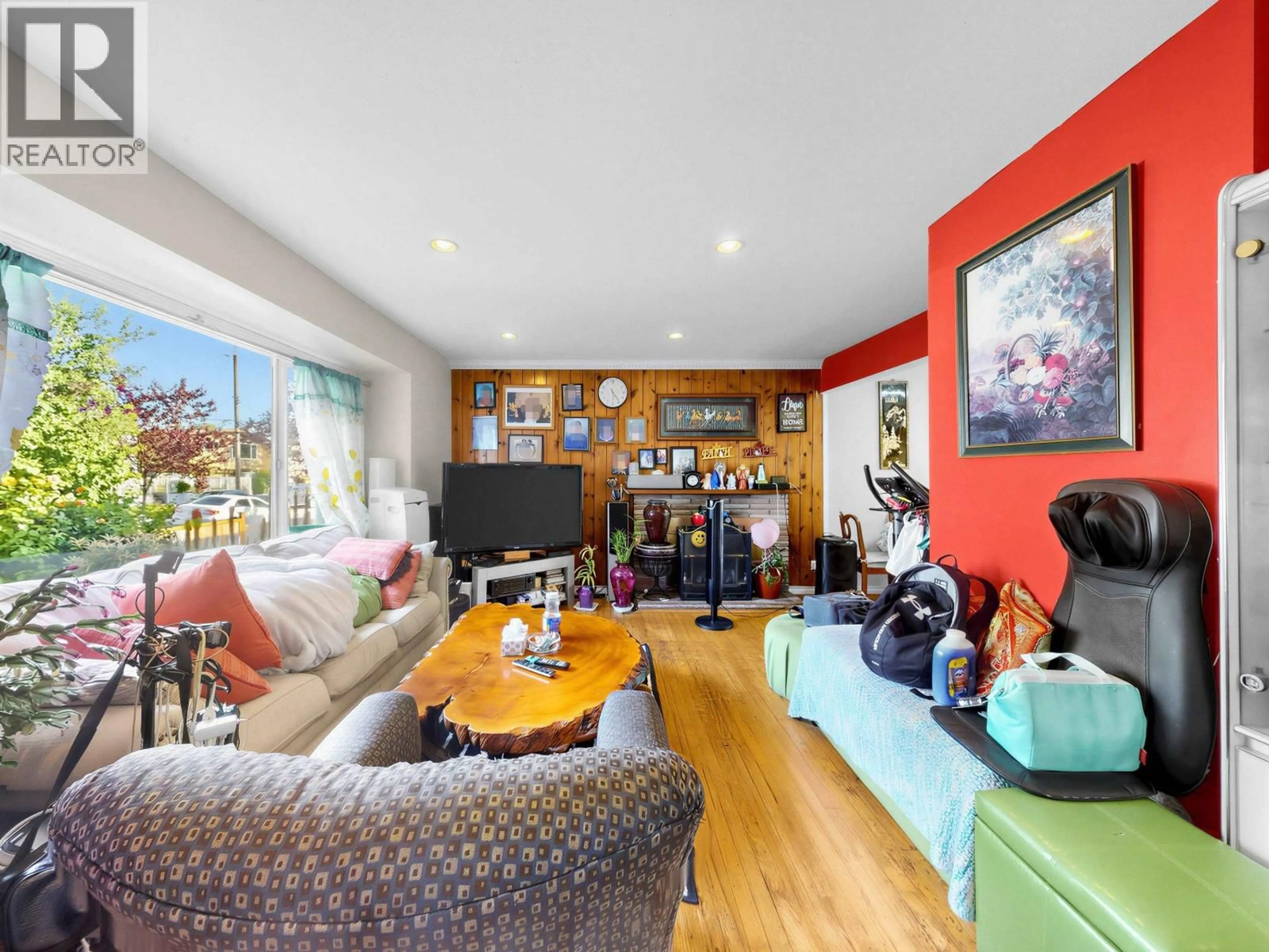 Living room with furniture, wood/laminate floor for 5033 KILLARNEY STREET, Vancouver British Columbia V5R3V8