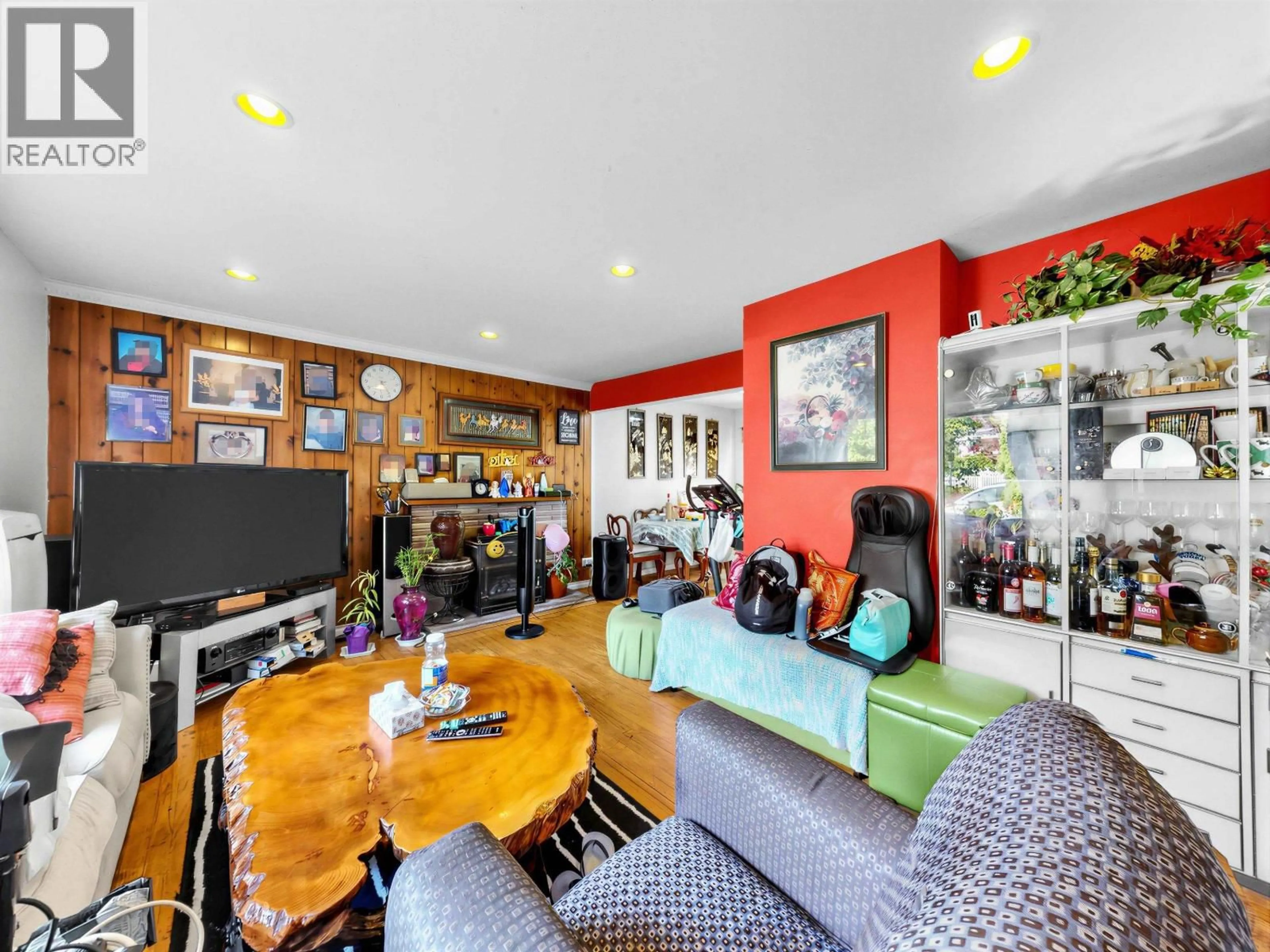 Living room with furniture, wood/laminate floor for 5033 KILLARNEY STREET, Vancouver British Columbia V5R3V8