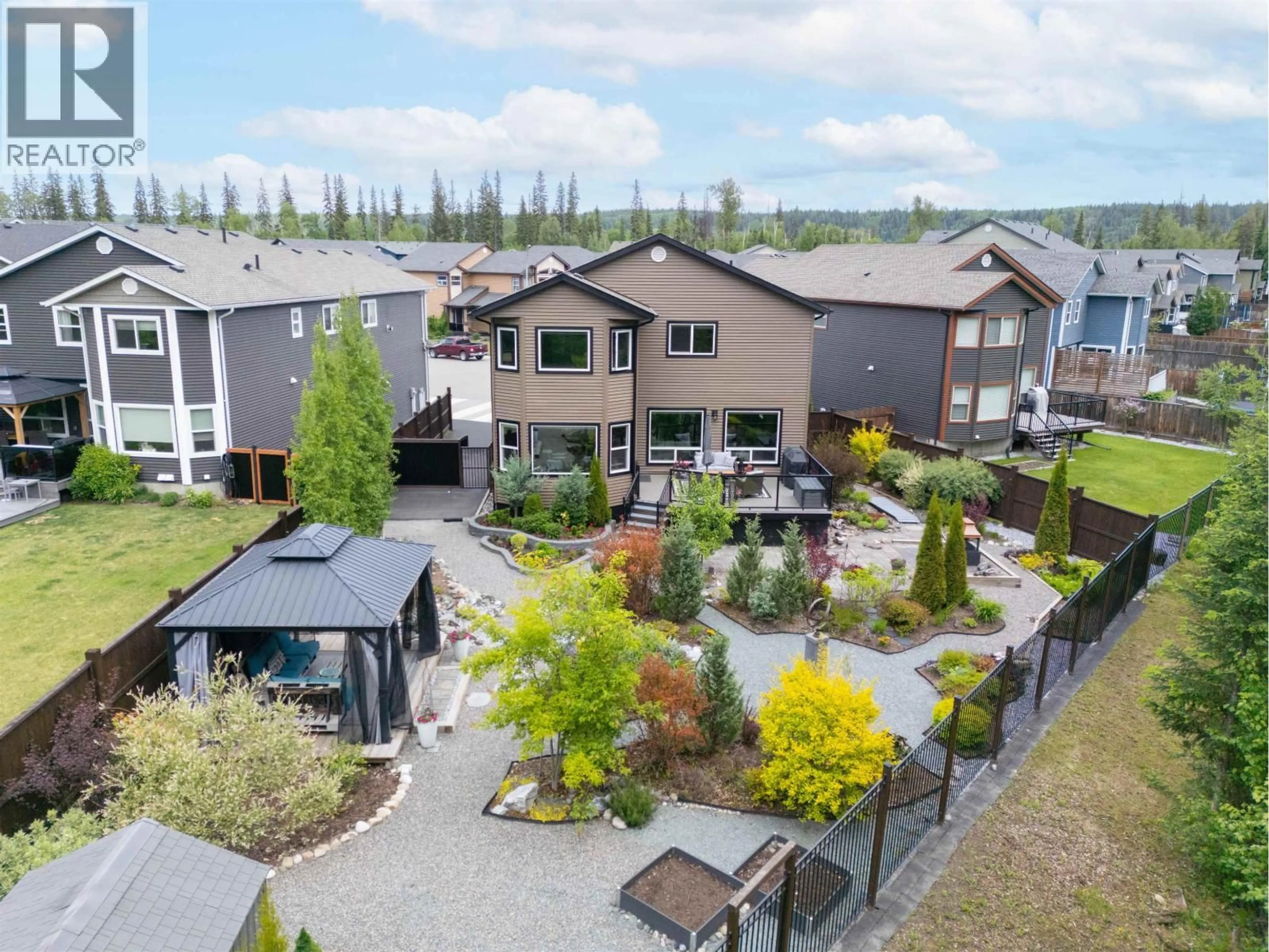 A pic from outside/outdoor area/front of a property/back of a property/a pic from drone, mountain view for 8001 STILLWATER CRESCENT, Prince George British Columbia V2N0C2