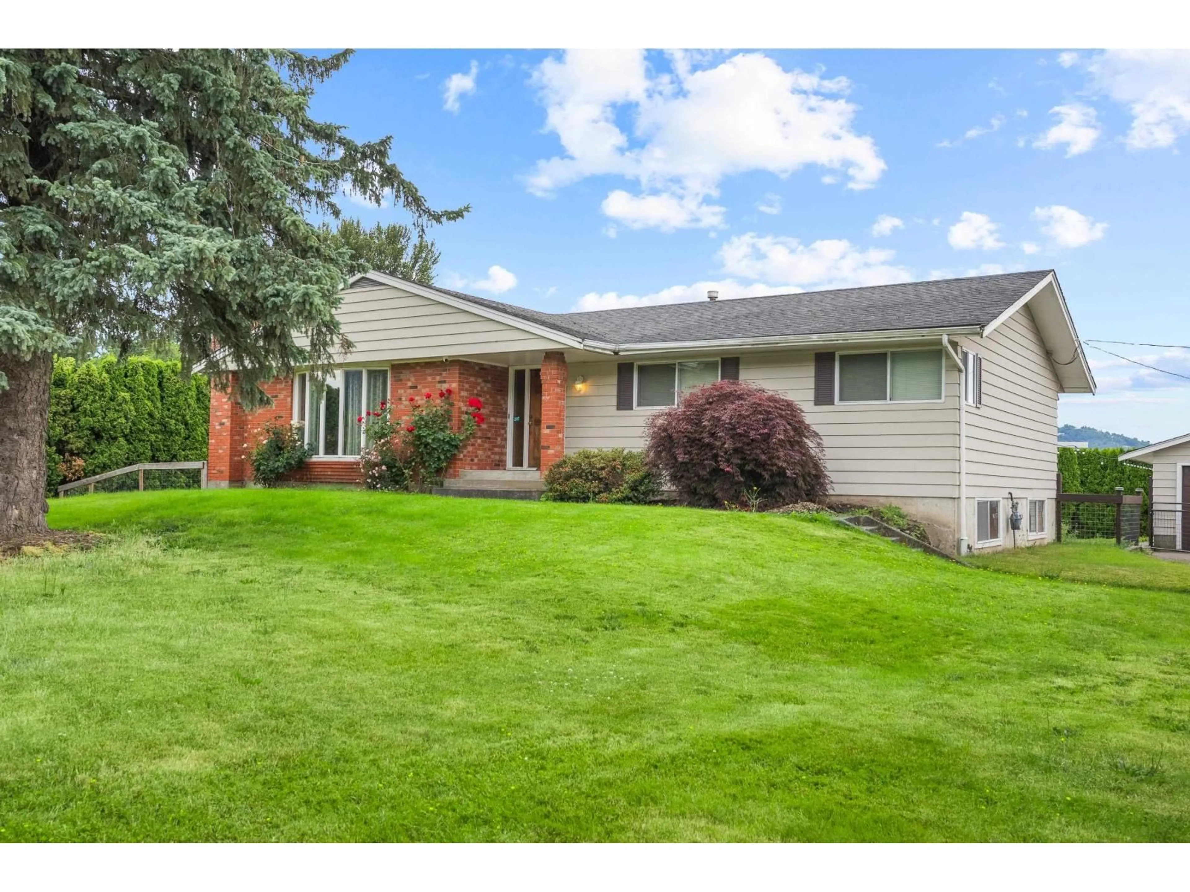 Home with vinyl exterior material, street for 44081 KEITH WILSON ROAD, Chilliwack British Columbia V2R4B5