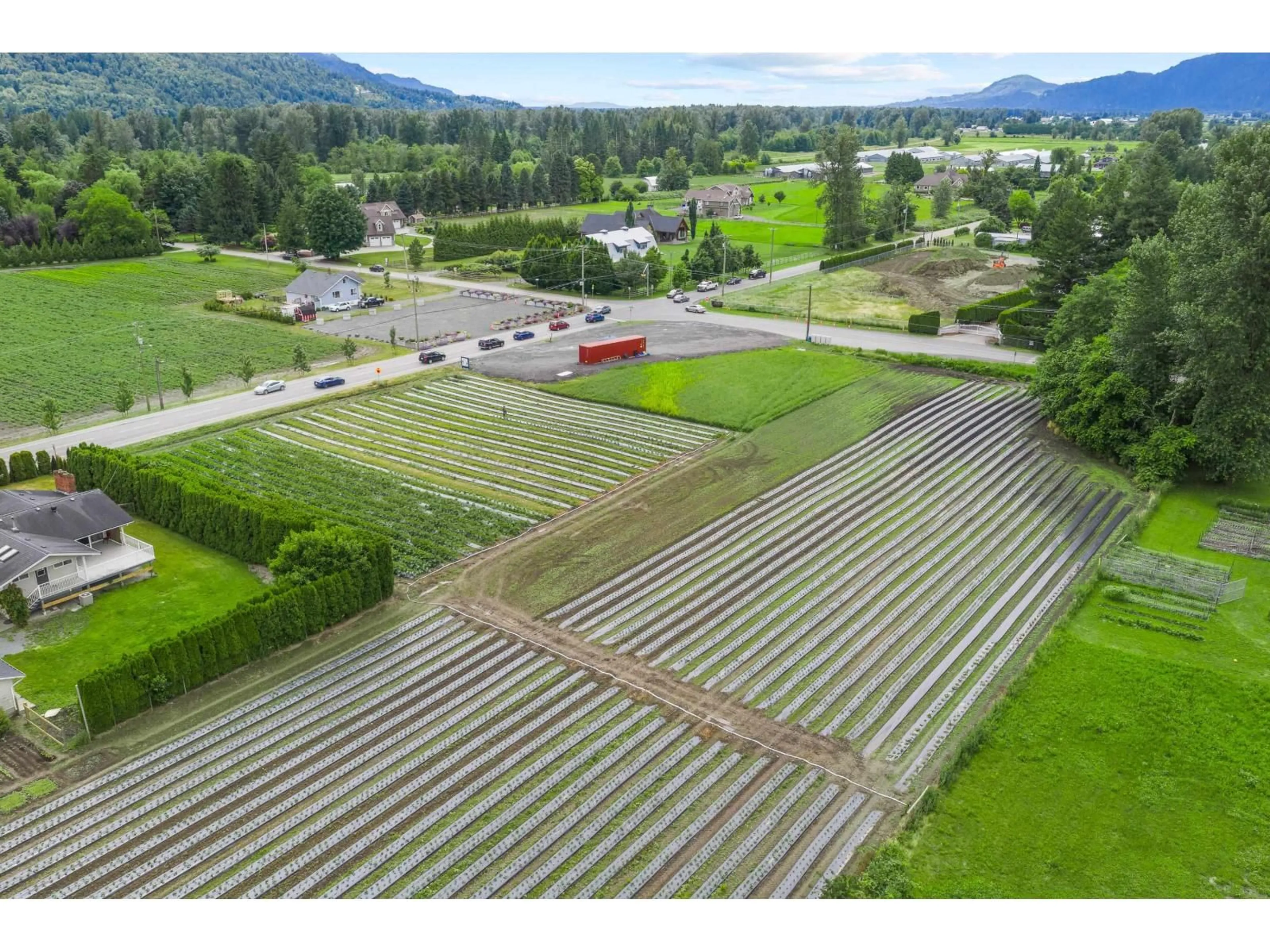 A pic from outside/outdoor area/front of a property/back of a property/a pic from drone, mountain view for 44081 KEITH WILSON ROAD, Chilliwack British Columbia V2R4B5