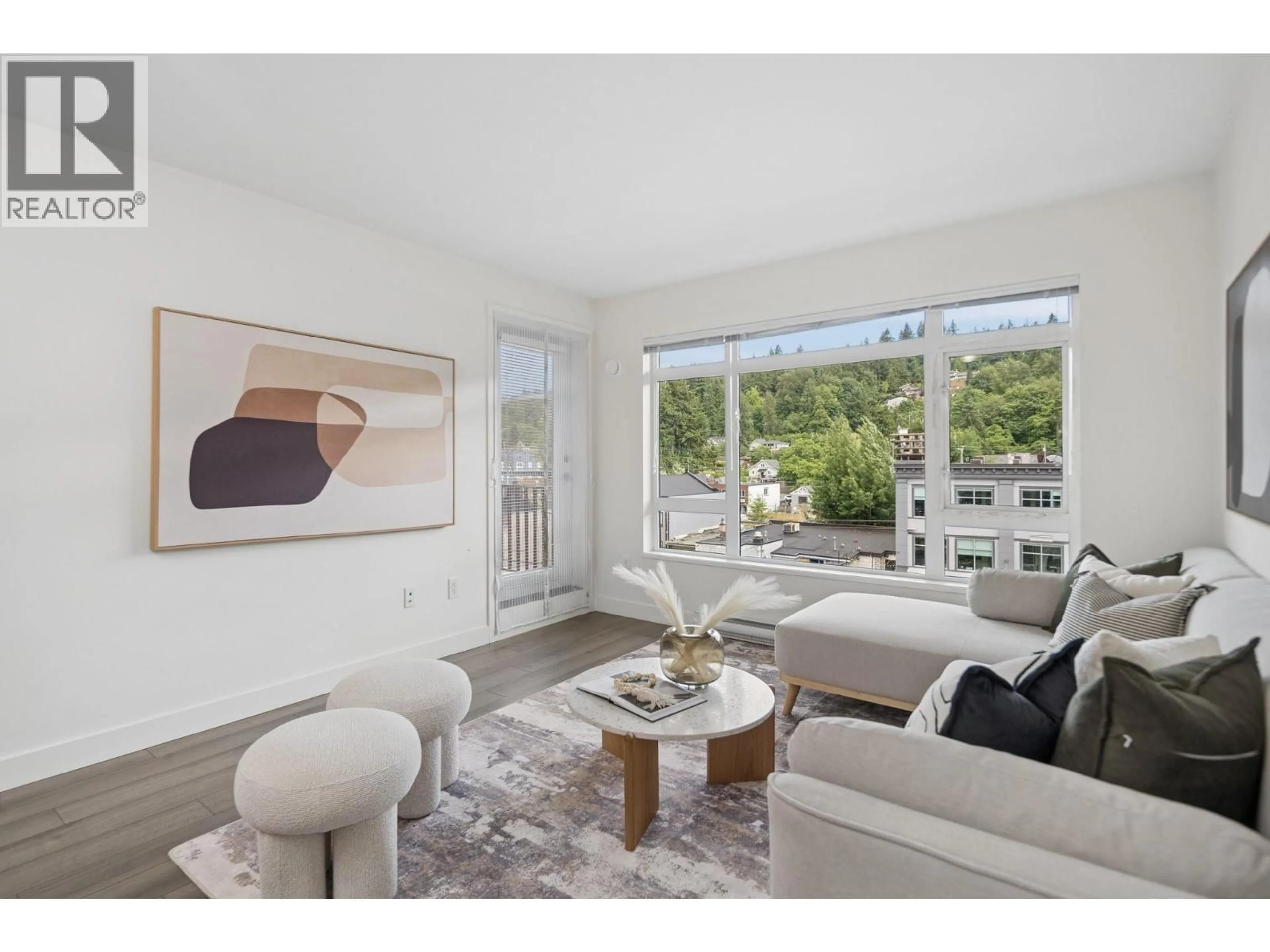 Living room with furniture, unknown for 501 - 2525 CLARKE STREET, Port Moody British Columbia V3H1Z3