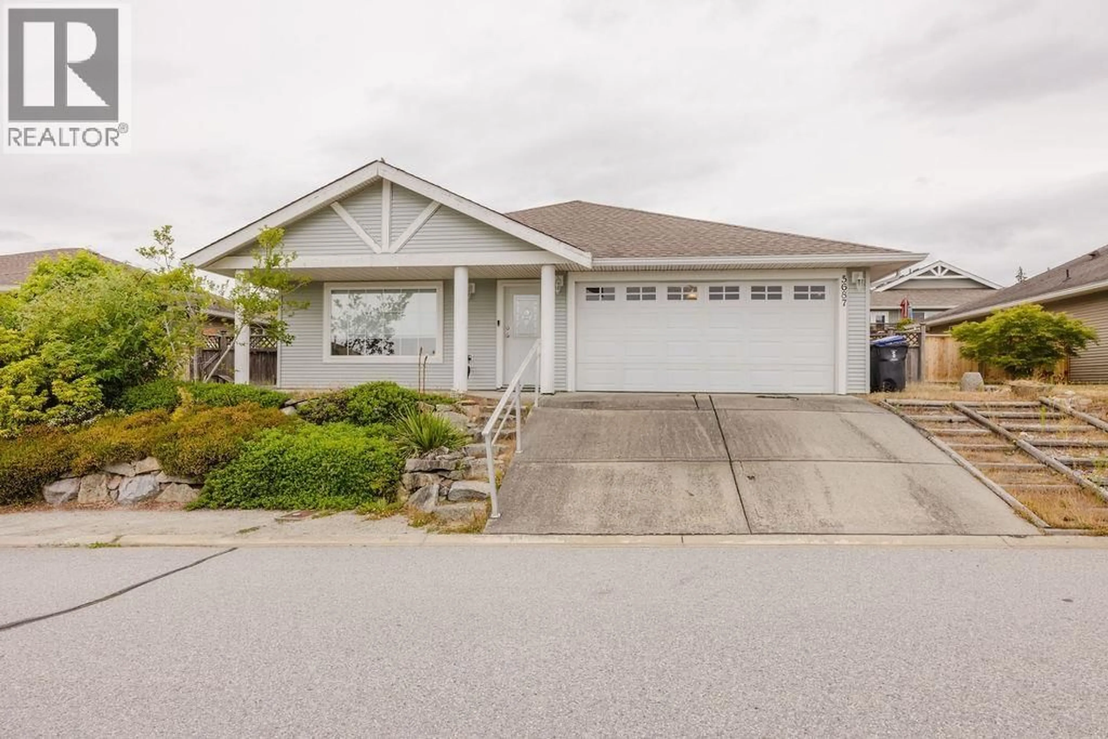Home with vinyl exterior material, street for 5687 EMILY WAY, Sechelt British Columbia V7Z0N5