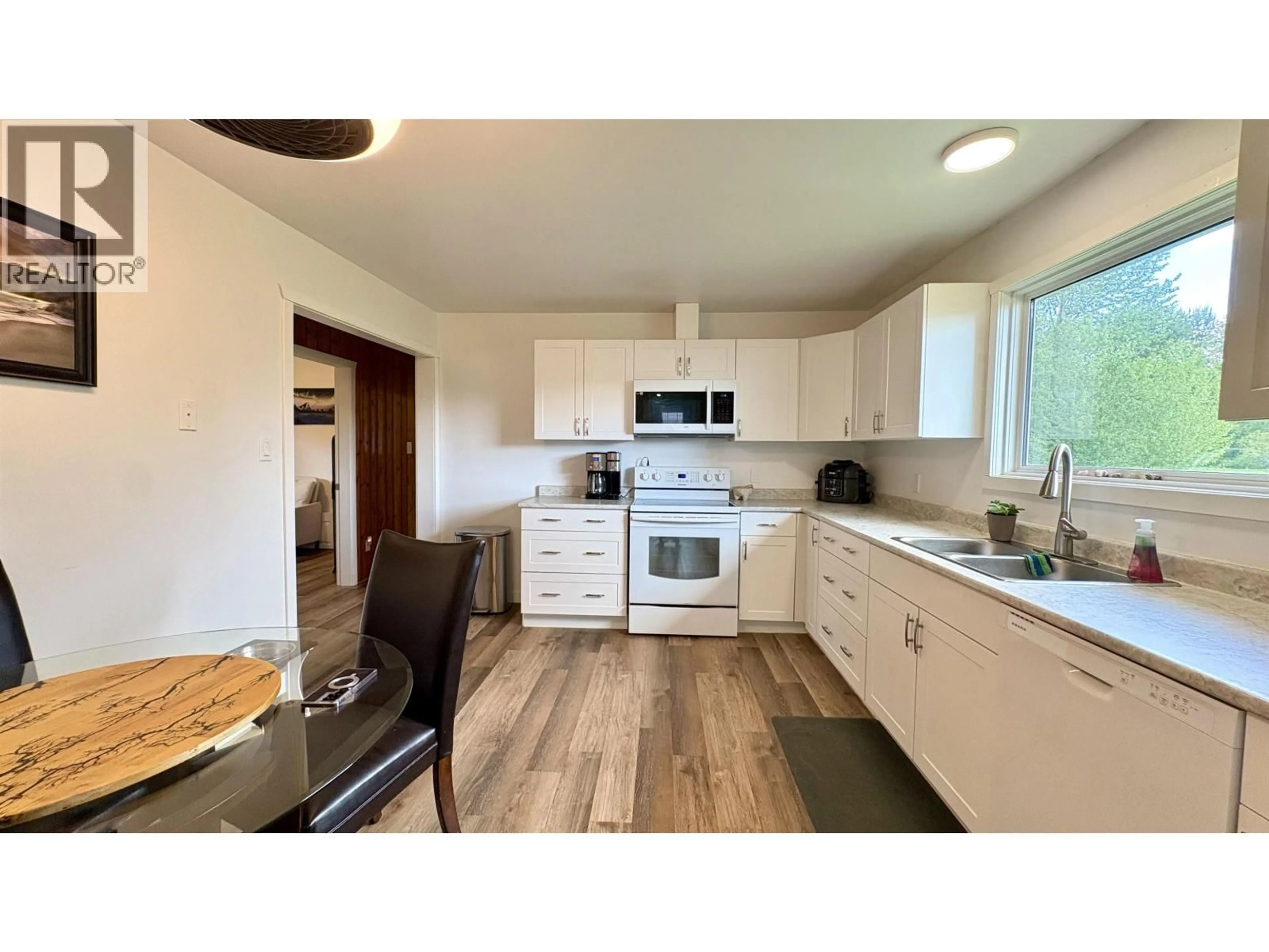 Open concept kitchen, wood/laminate floor for 14500 UPPER FRASER ROAD, Prince George British Columbia V2K5C9