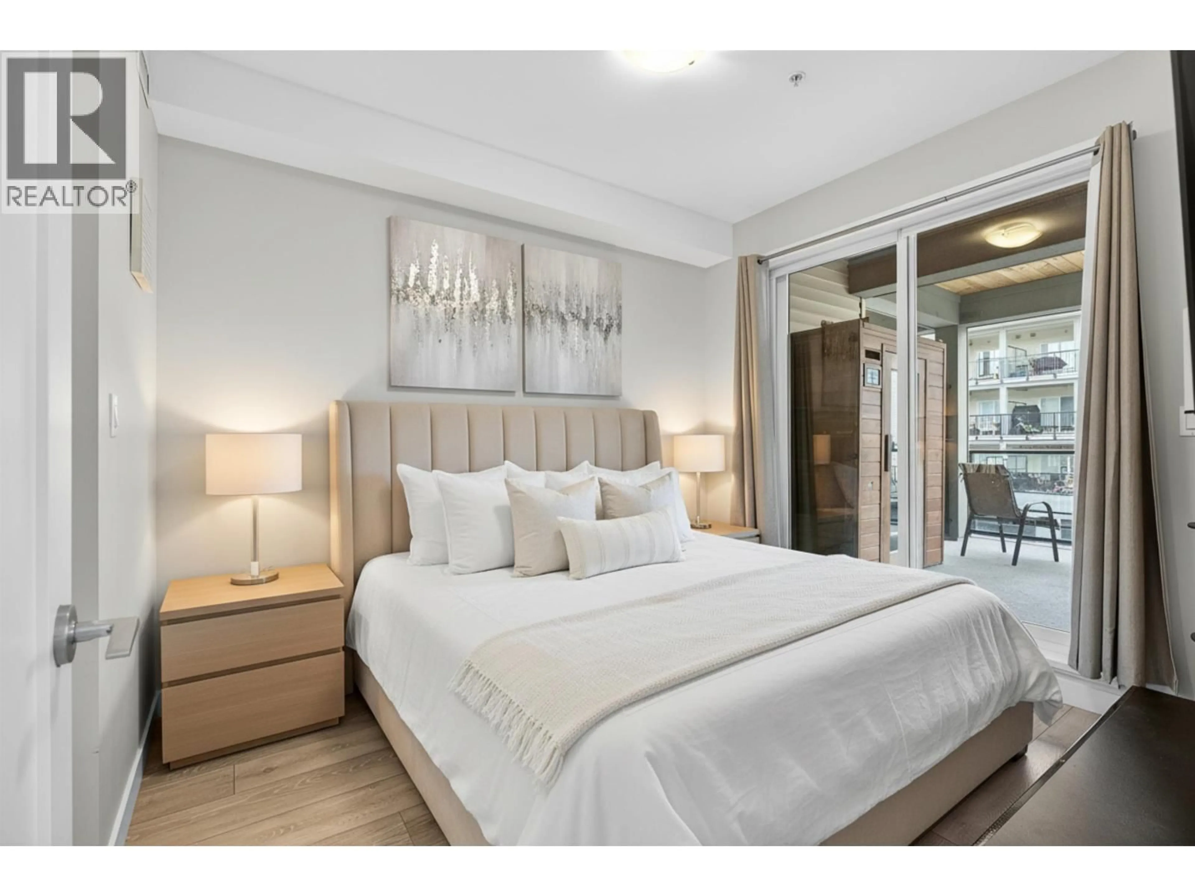Bedroom with bed, wood/laminate floor for 307 - 23233 GILLEY ROAD, Richmond British Columbia V6V1E6