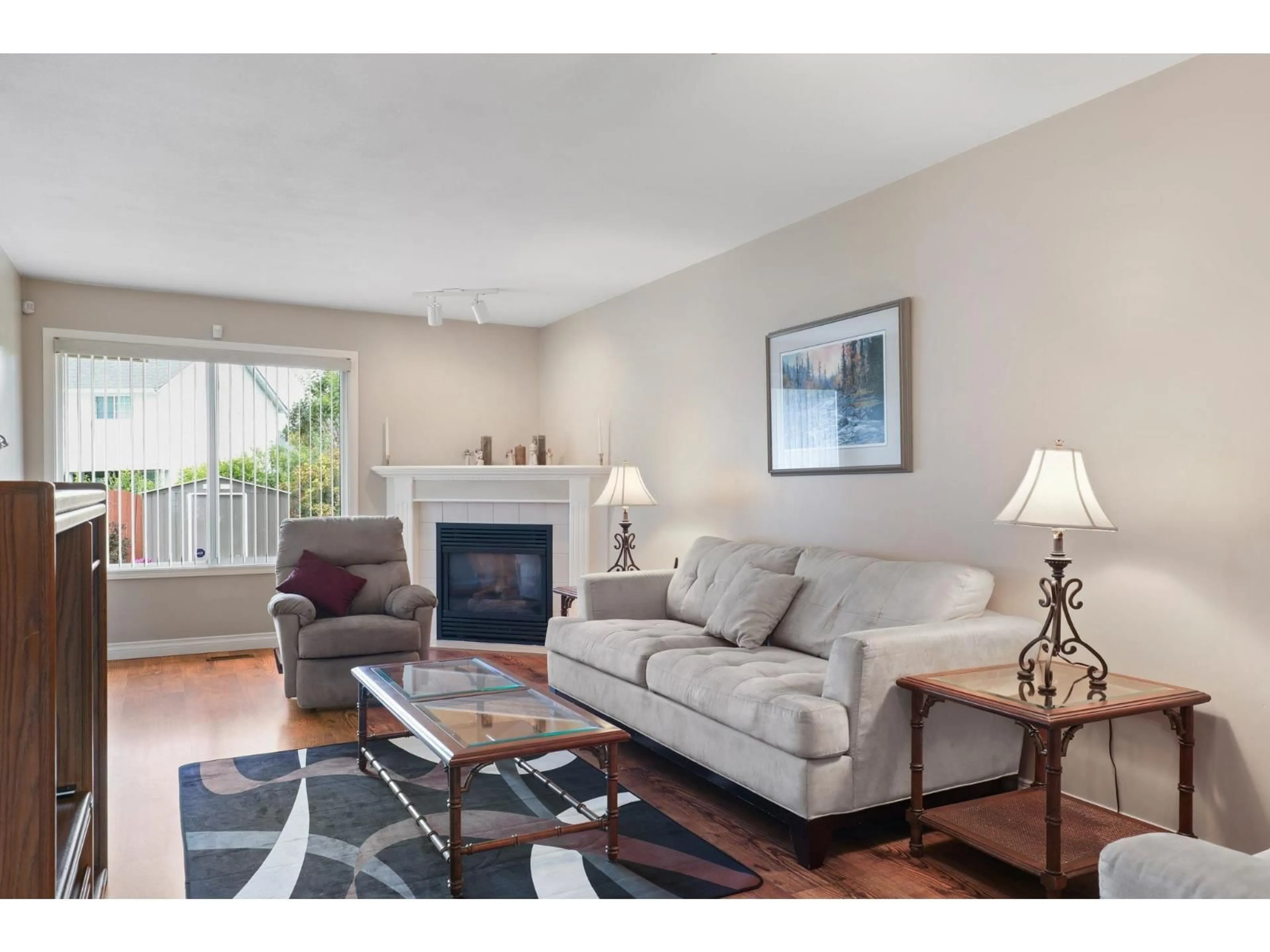 Living room with furniture, wood/laminate floor for 1 - 45365 WATSON ROAD, Chilliwack British Columbia V2R2H5