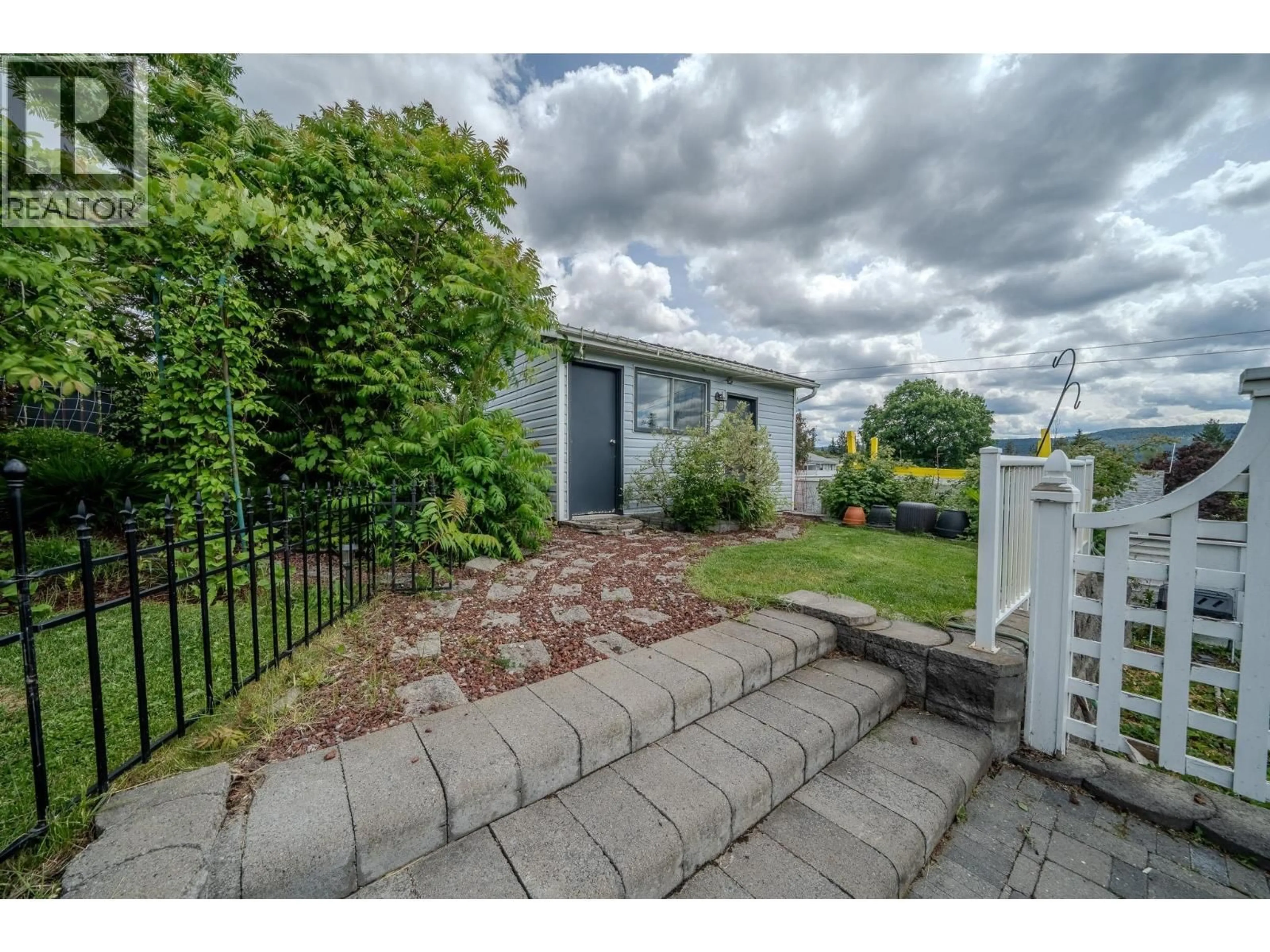 A pic from outside/outdoor area/front of a property/back of a property/a pic from drone, street for 480 SMITH STREET, Williams Lake British Columbia V2G4A3
