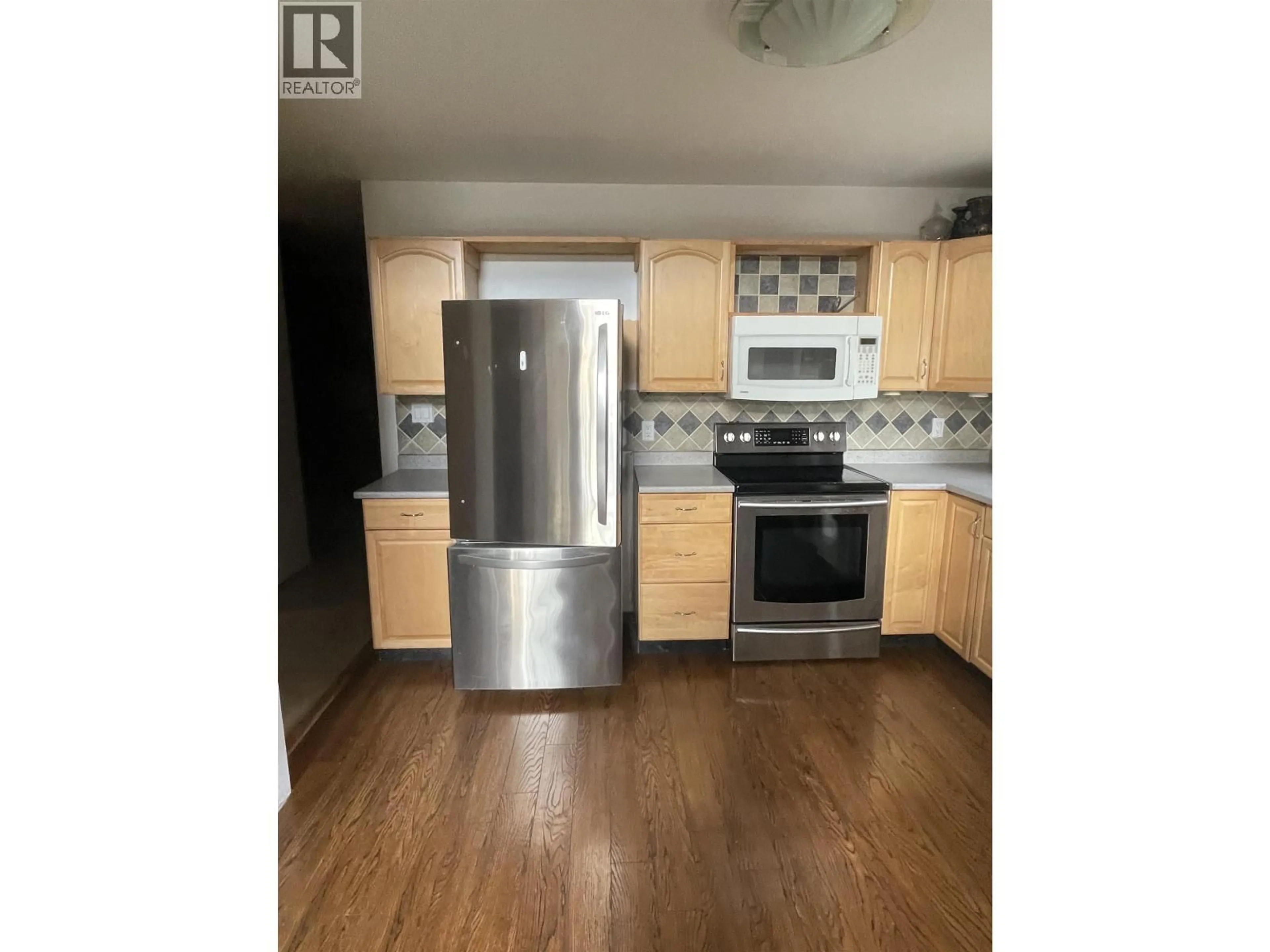 Standard kitchen, wood/laminate floor for 368 CINNAMON STREET, Bear Lake British Columbia V0J3G0