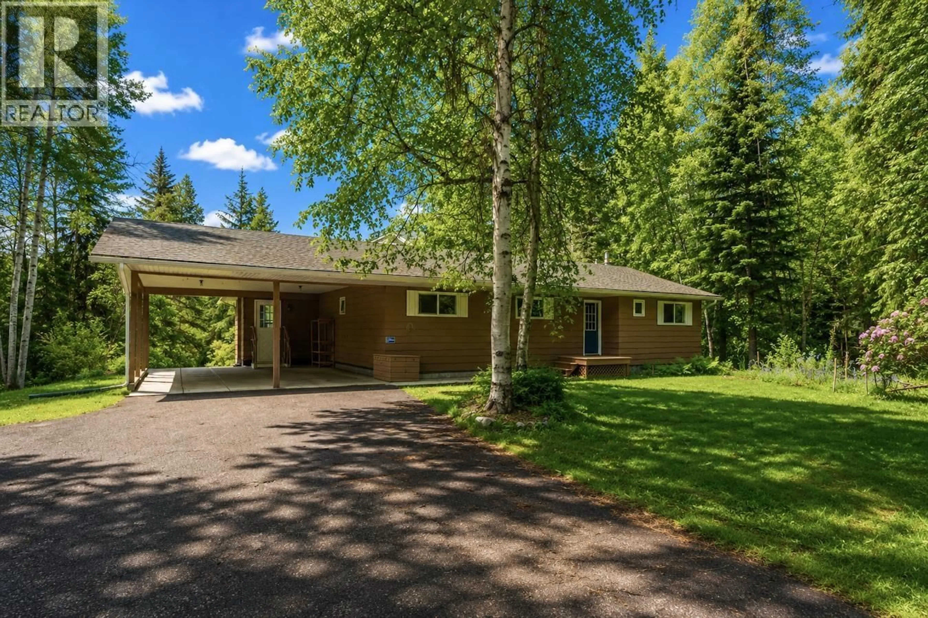 A pic from outside/outdoor area/front of a property/back of a property/a pic from drone, street for 7411 TOOMBS DRIVE, Prince George British Columbia V2K5A2