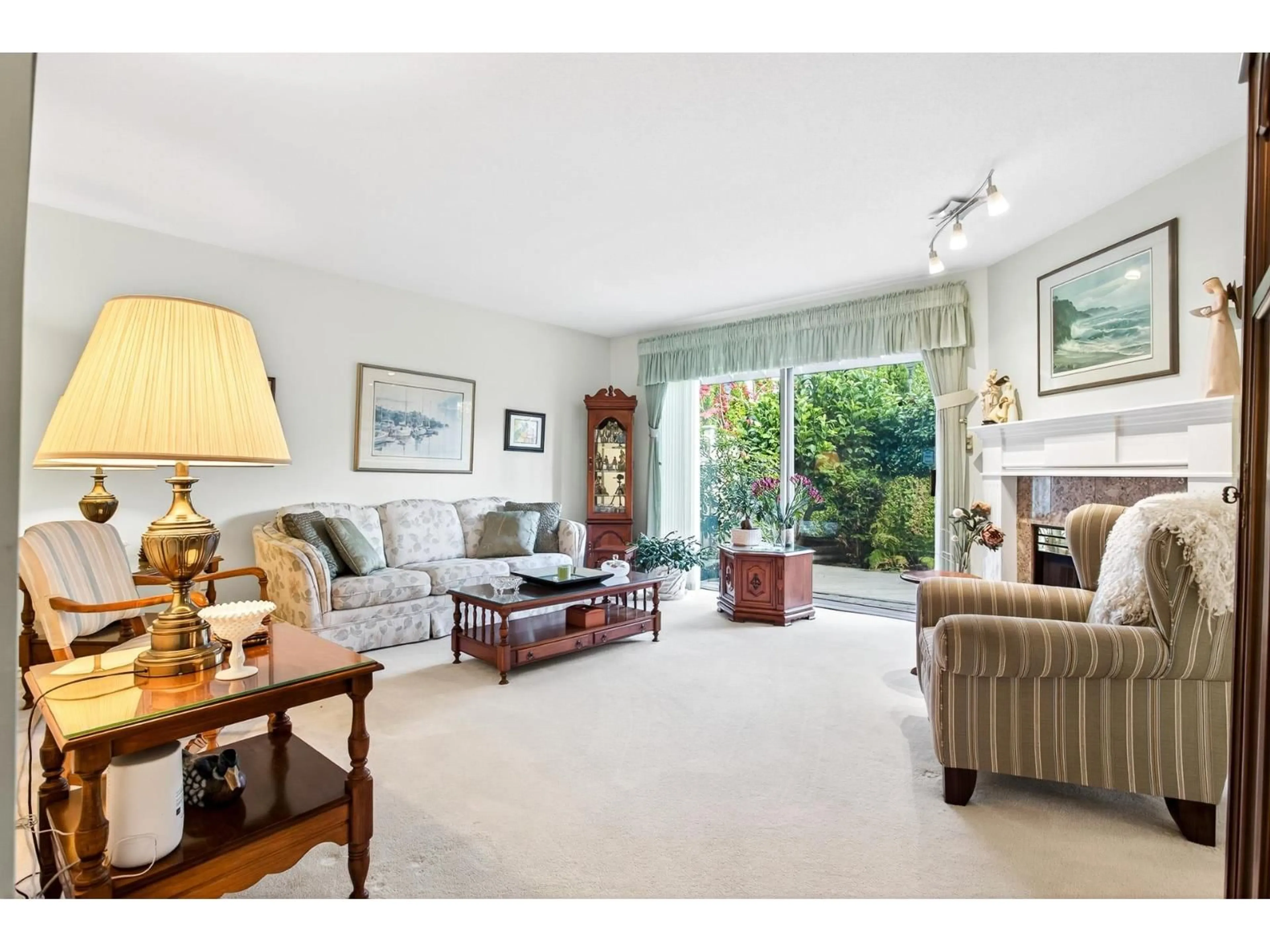 Living room with furniture, unknown for 101 - 16275 15 AVENUE, Surrey British Columbia V4A1L4