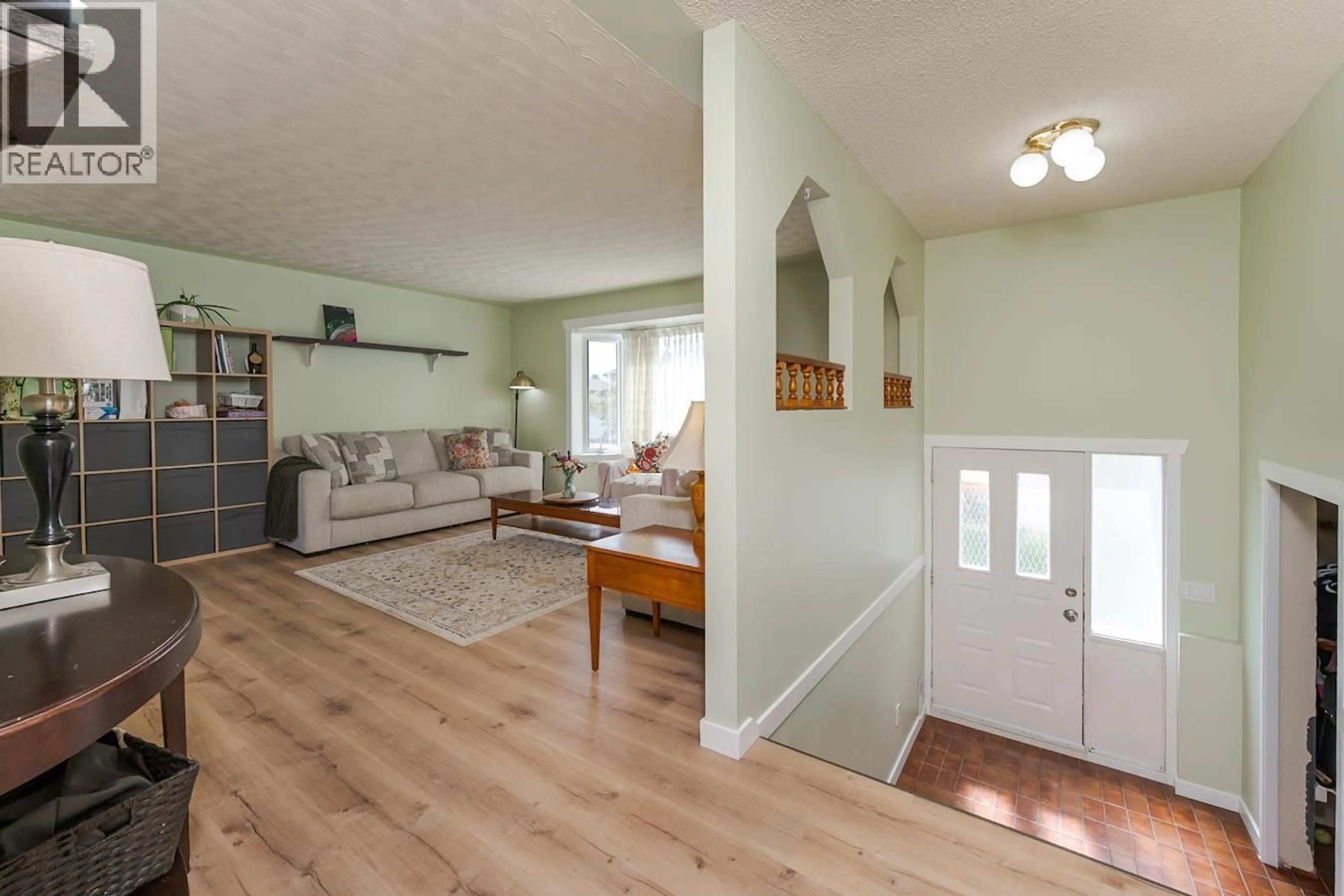 Living room with furniture, wood/laminate floor for 3808 GRACE CRESCENT, Prince George British Columbia V2N4N5