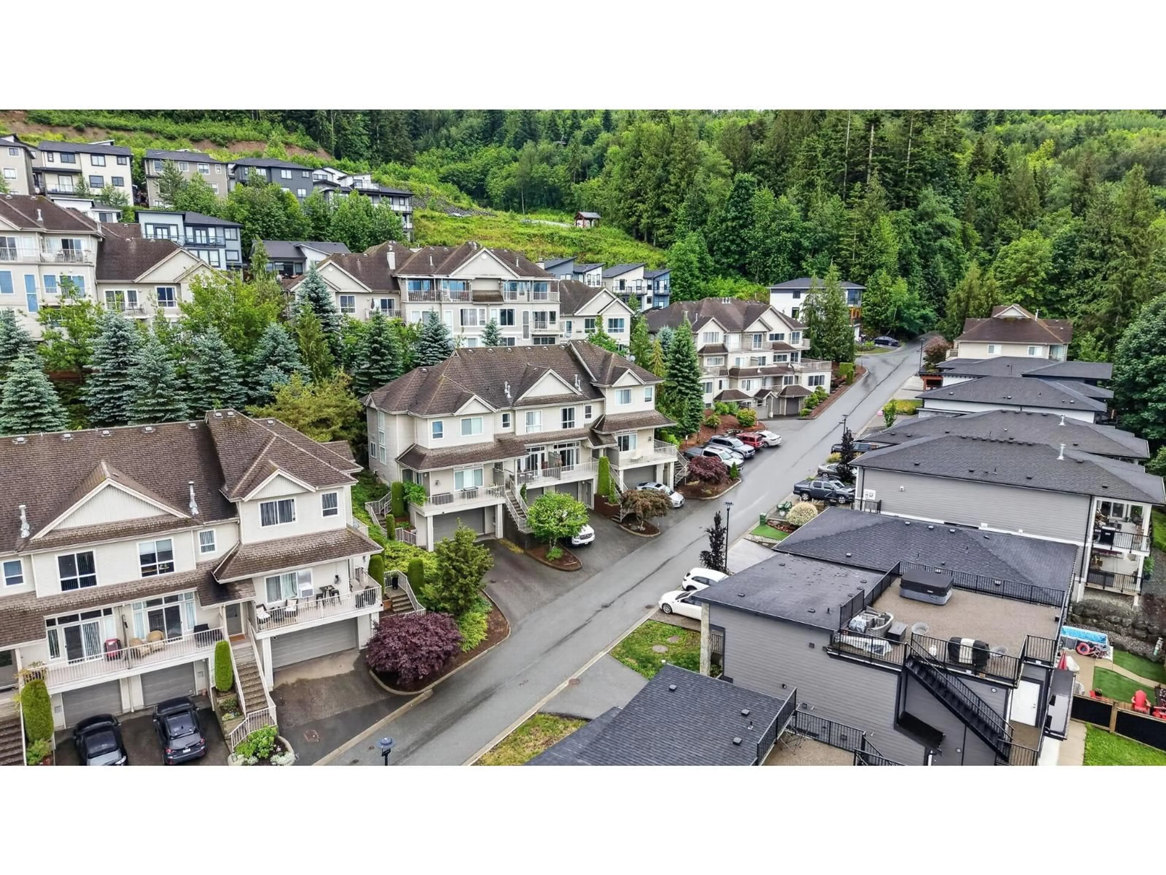 A pic from outside/outdoor area/front of a property/back of a property/a pic from drone, mountain view for 1503 - 5260 GOLDSPRING PLACE, Chilliwack British Columbia V2R5S5