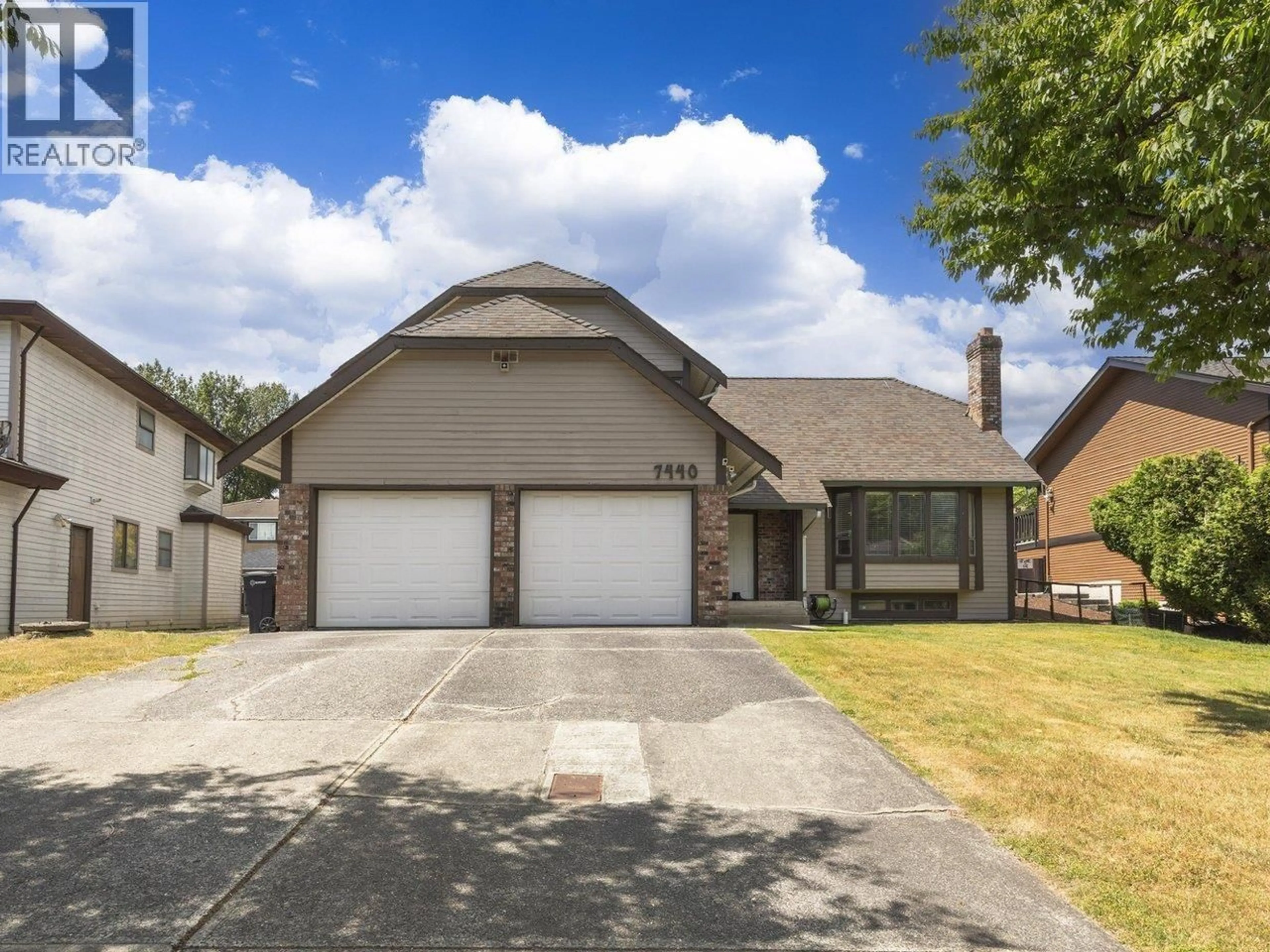 Home with vinyl exterior material, street for 7440 LAWRENCE DRIVE, Burnaby British Columbia V5A4G7