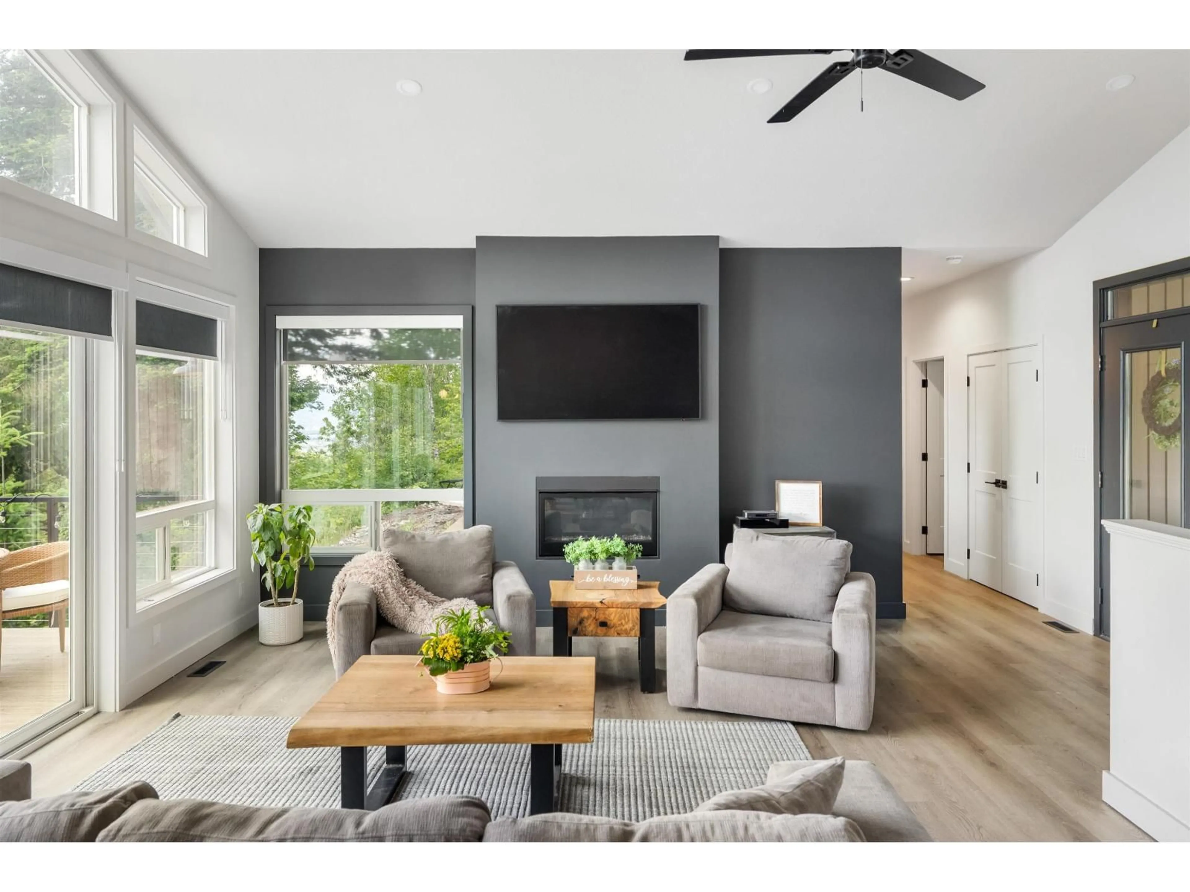 Living room with furniture, wood/laminate floor for 6190 PARSONS ROAD, Chilliwack British Columbia V4Z1A4