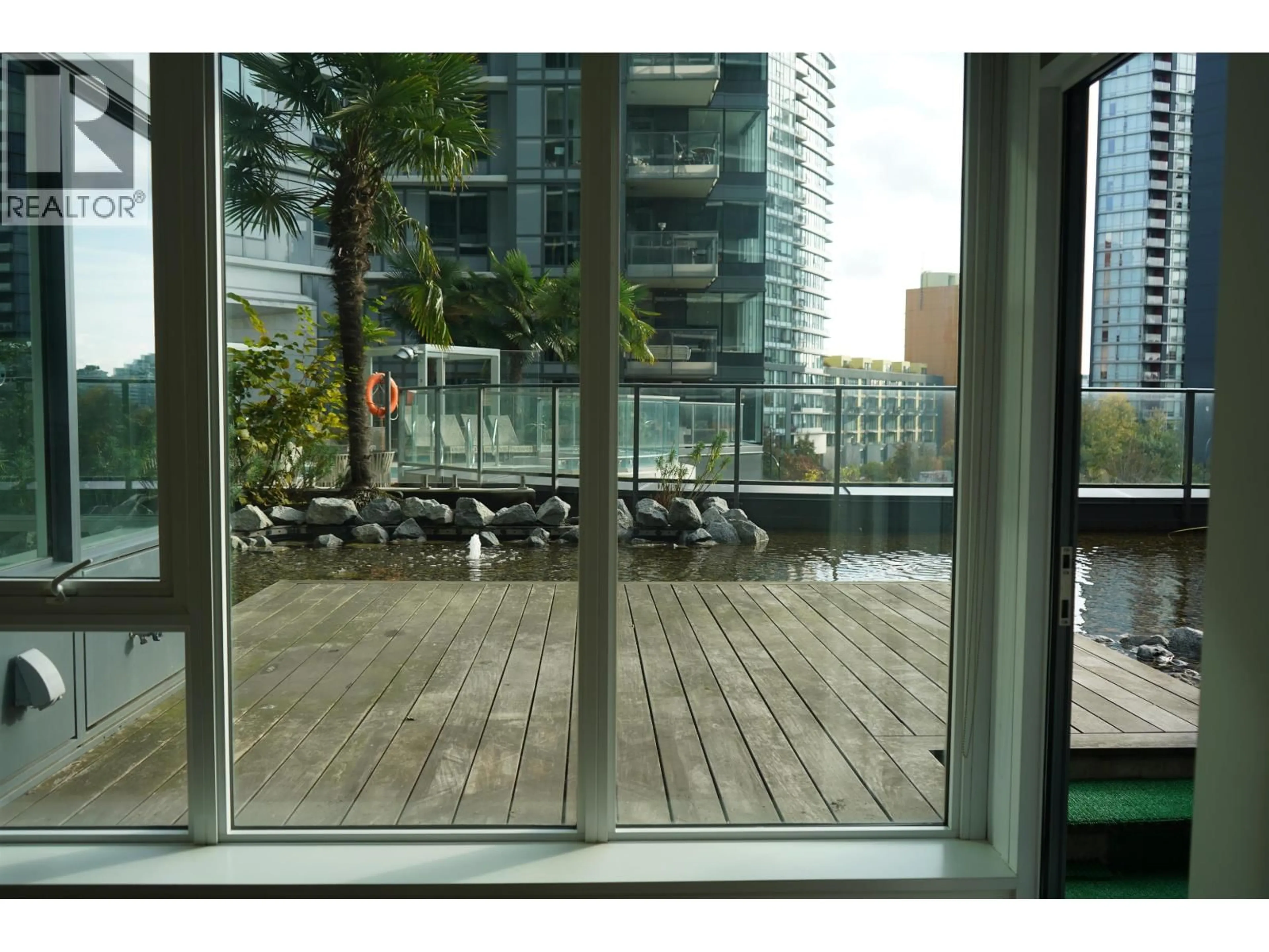 Patio, city buildings view from balcony for 306 - 68 SMITHE STREET, Vancouver British Columbia V6B0P4