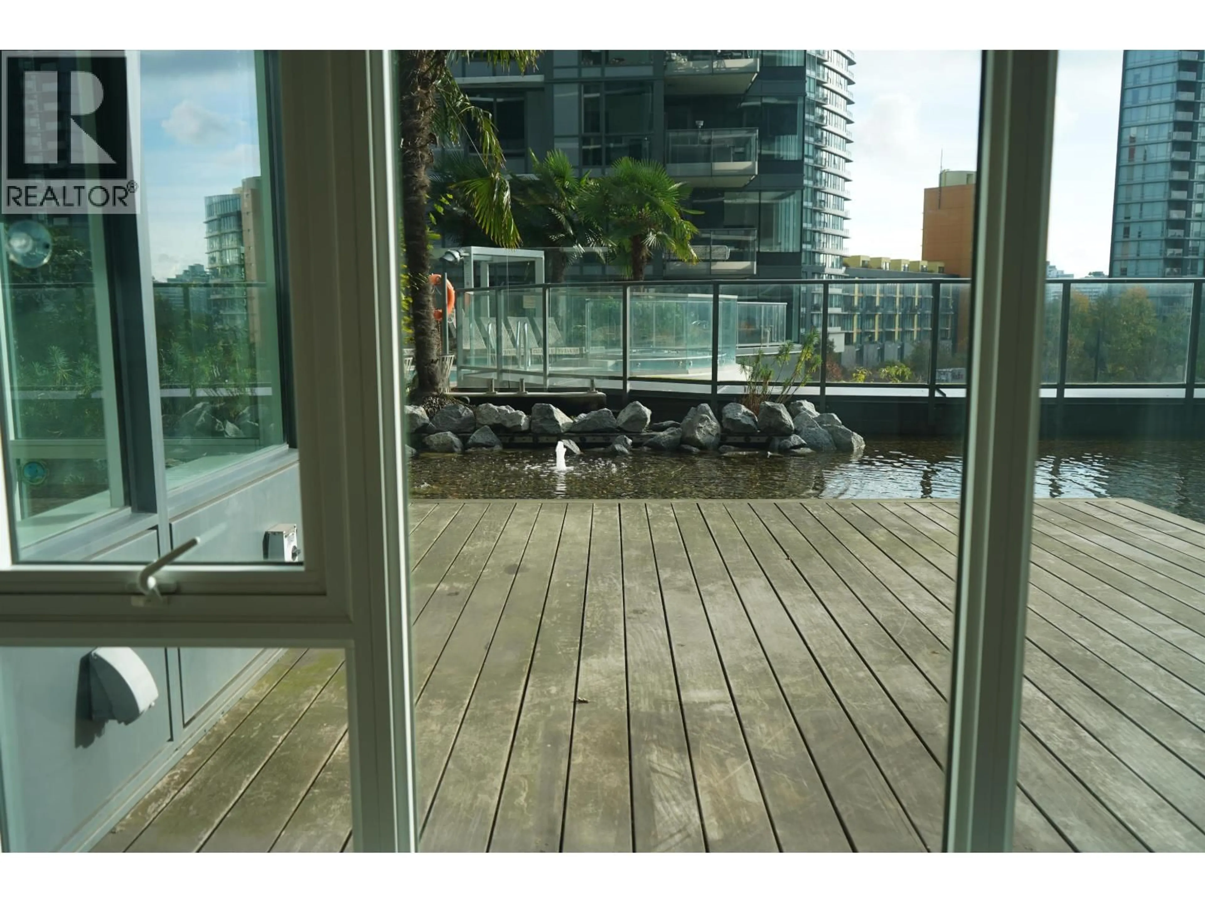 Patio, city buildings view from balcony for 306 - 68 SMITHE STREET, Vancouver British Columbia V6B0P4