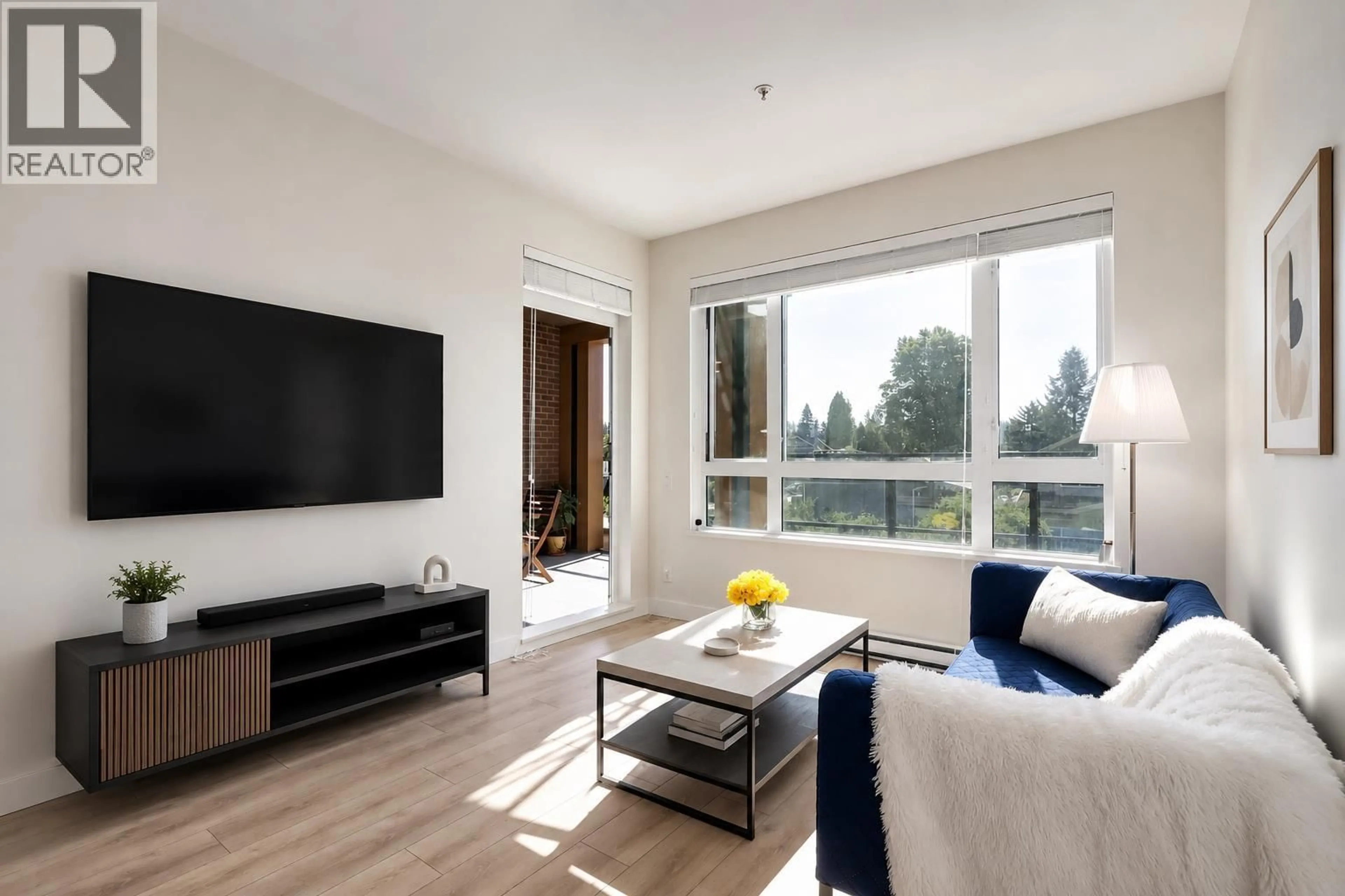 Living room with furniture, wood/laminate floor for 322 - 721 ANSKAR COURT, Coquitlam British Columbia V3J0L4