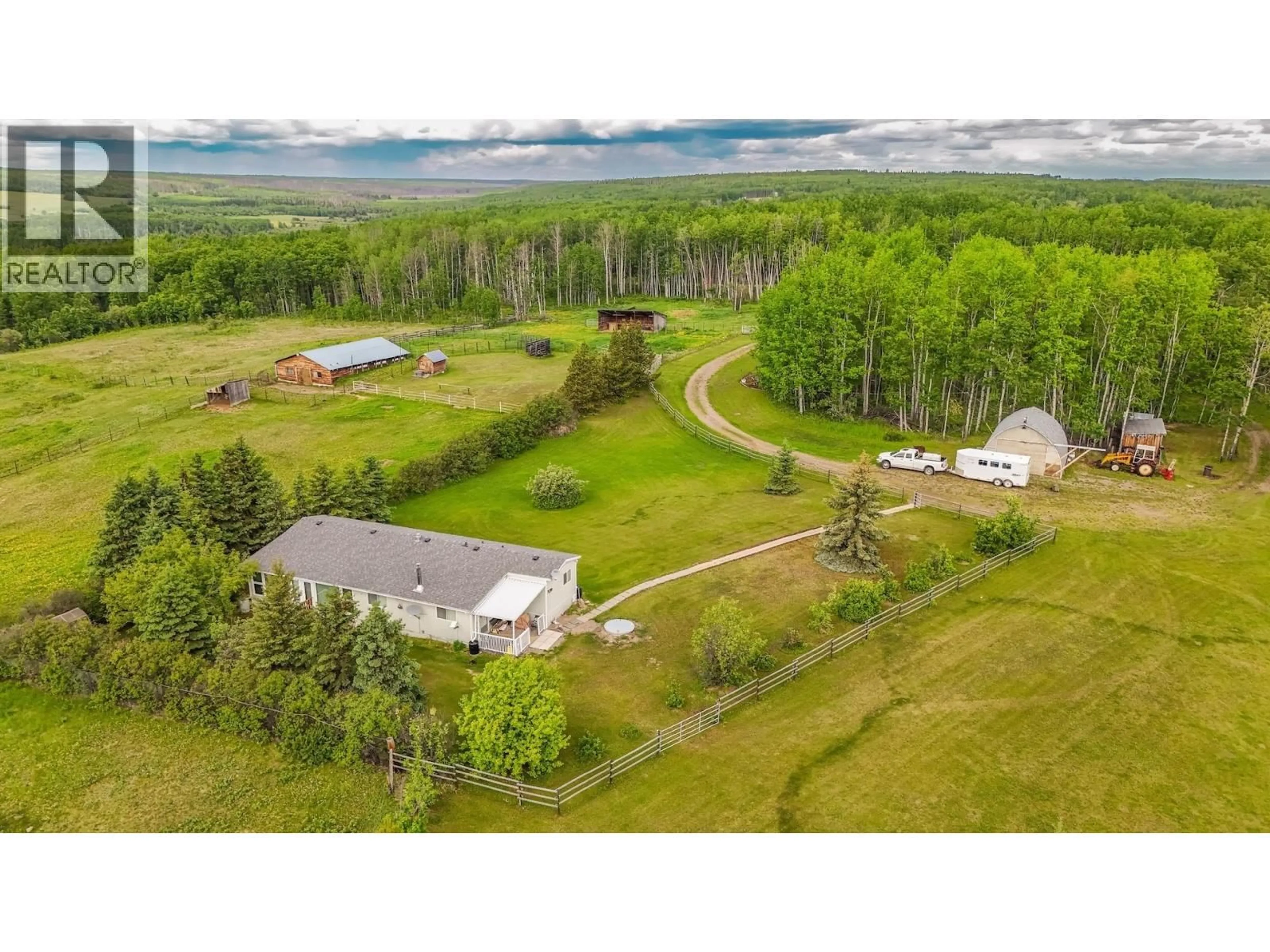 A pic from outside/outdoor area/front of a property/back of a property/a pic from drone, unknown for 14179 258 ROAD, Fort St. John British Columbia V0C1Y0