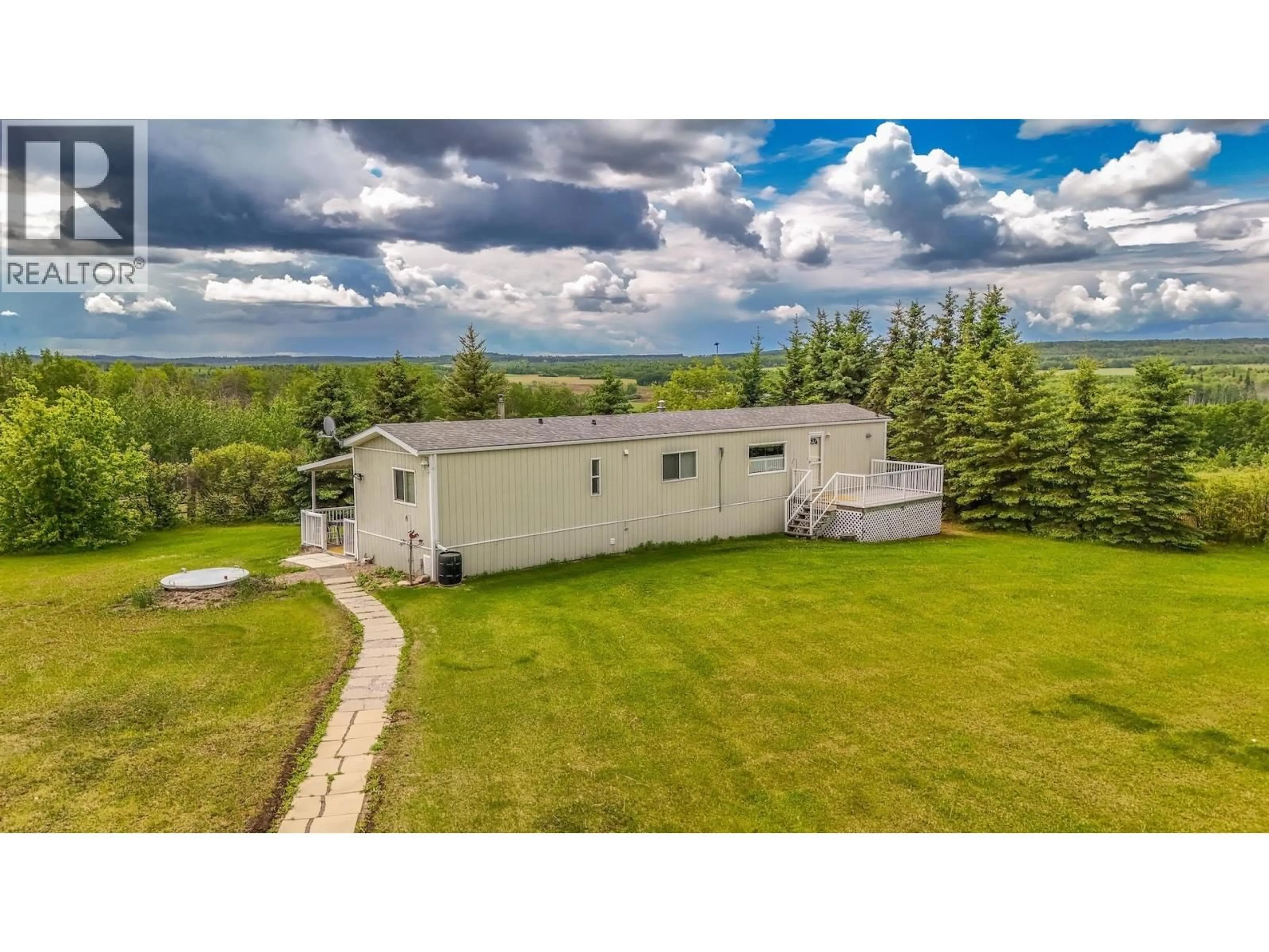 A pic from outside/outdoor area/front of a property/back of a property/a pic from drone, mountain view for 14179 258 ROAD, Fort St. John British Columbia V0C1Y0