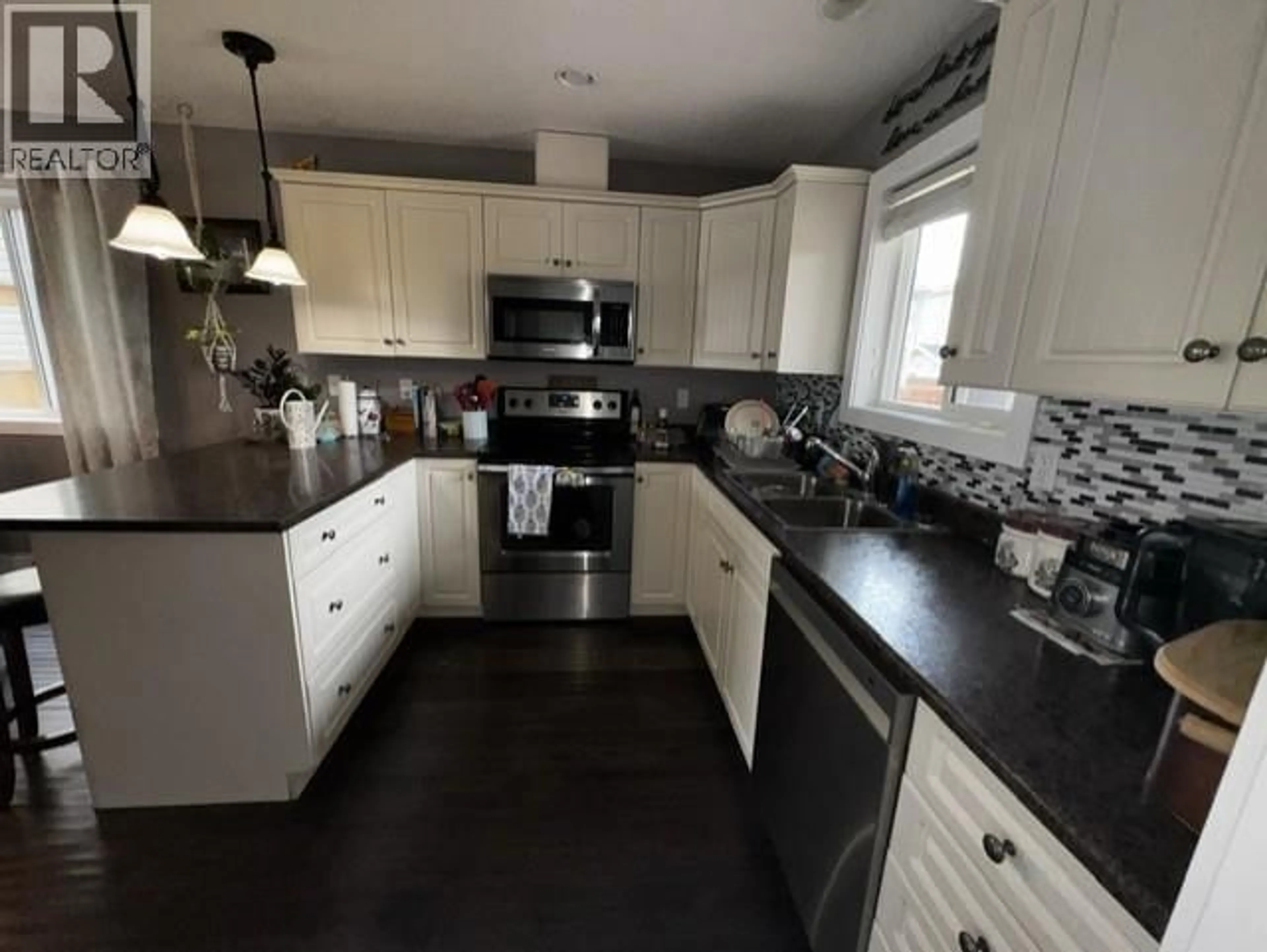 Open concept kitchen, unknown for 8313 87 STREET, Fort St. John British Columbia V1J0H4