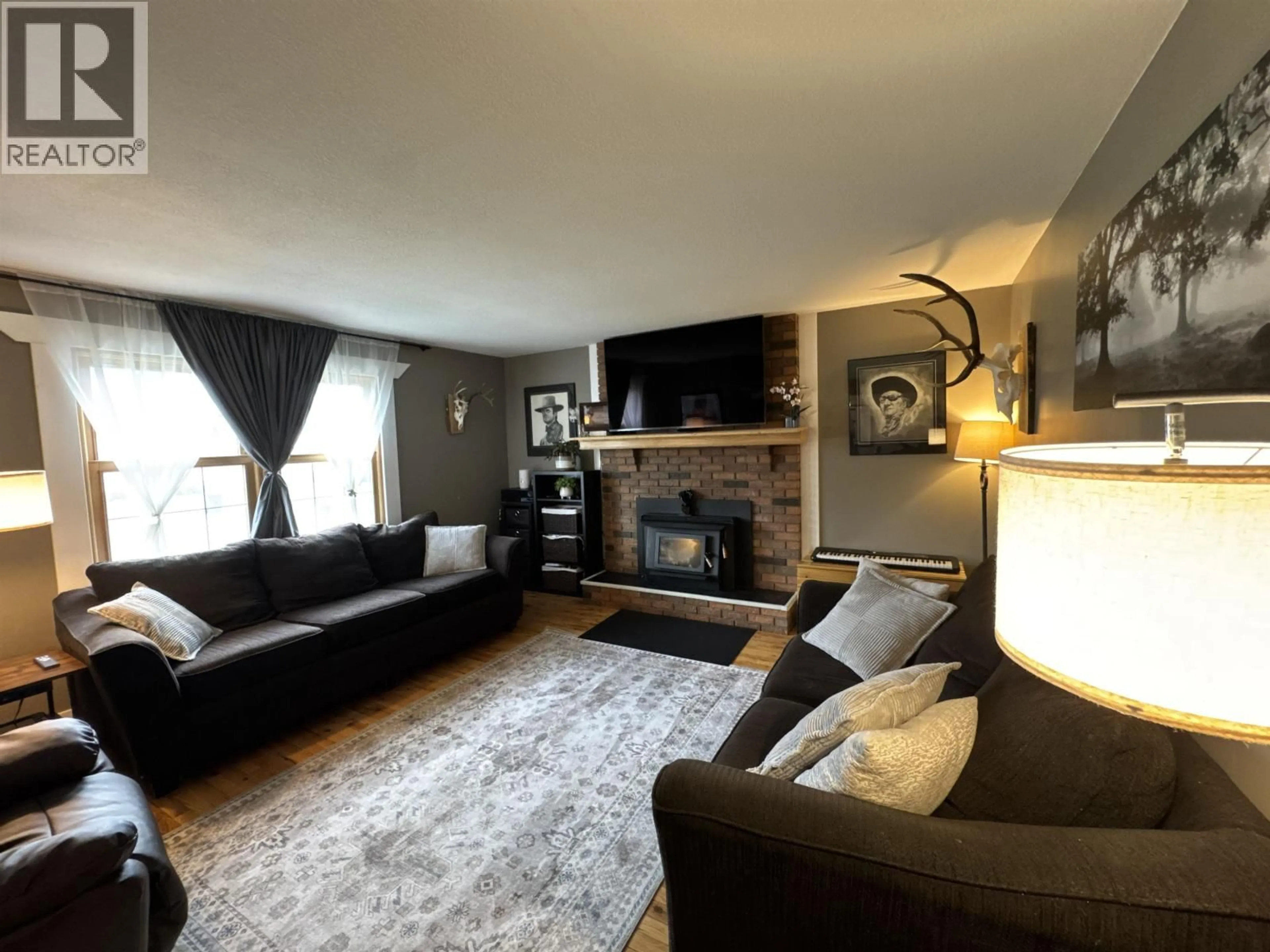 Living room with furniture, unknown for 11215 93 STREET, Fort St. John British Columbia V1J4W5