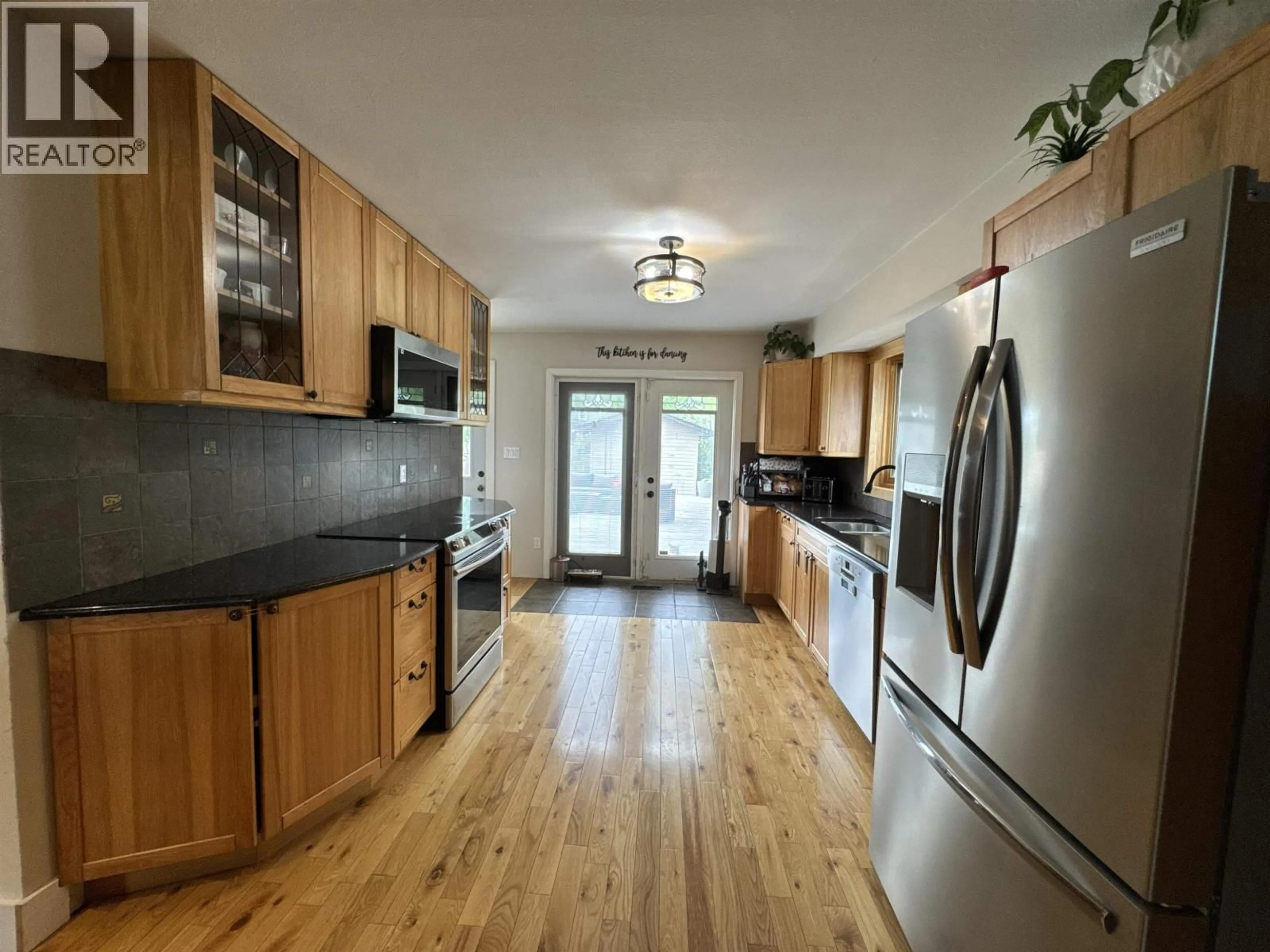 Open concept kitchen, unknown for 11215 93 STREET, Fort St. John British Columbia V1J4W5