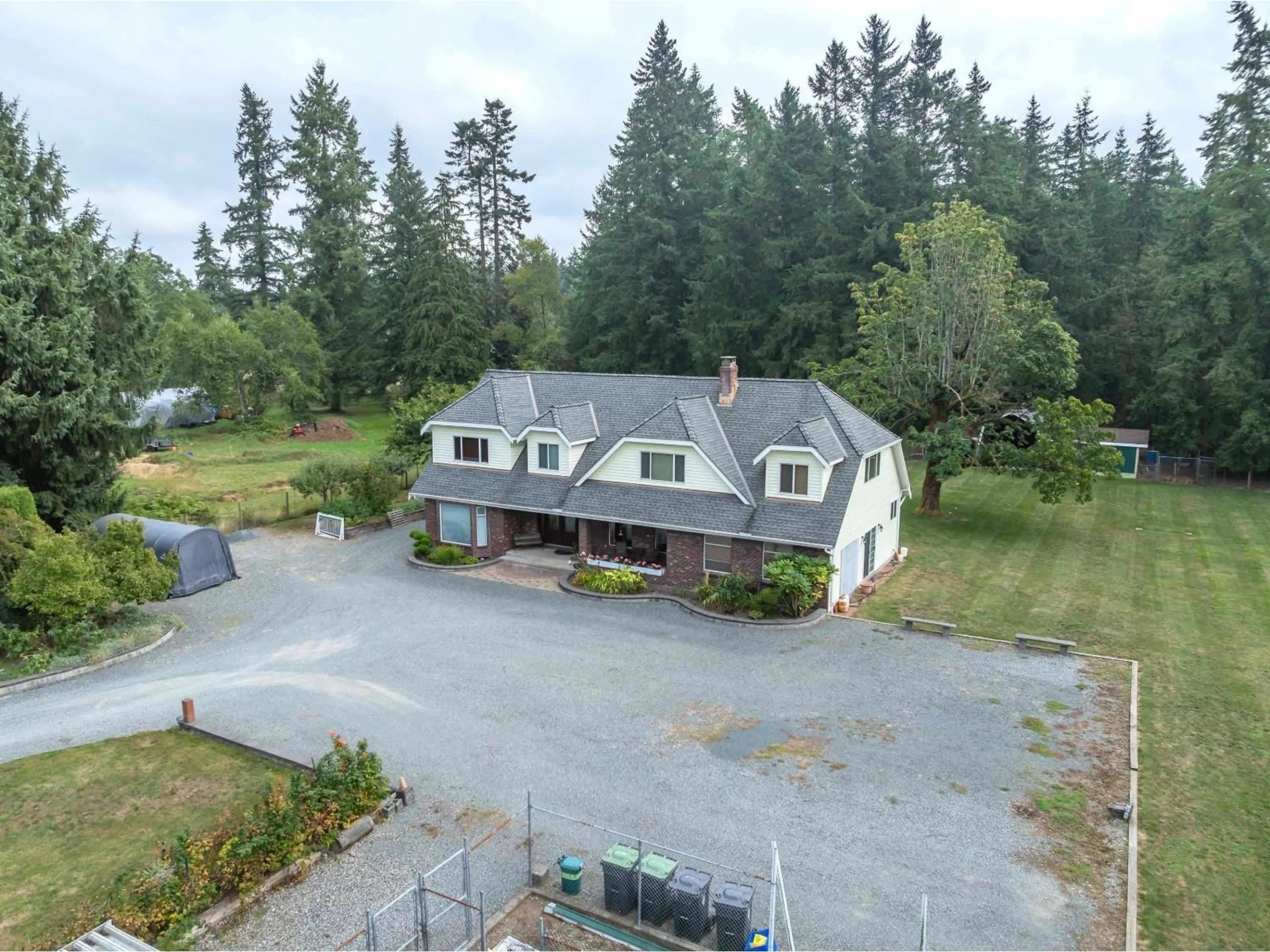A pic from outside/outdoor area/front of a property/back of a property/a pic from drone, unknown for 2572 204 STREET, Langley British Columbia V2Z2B6