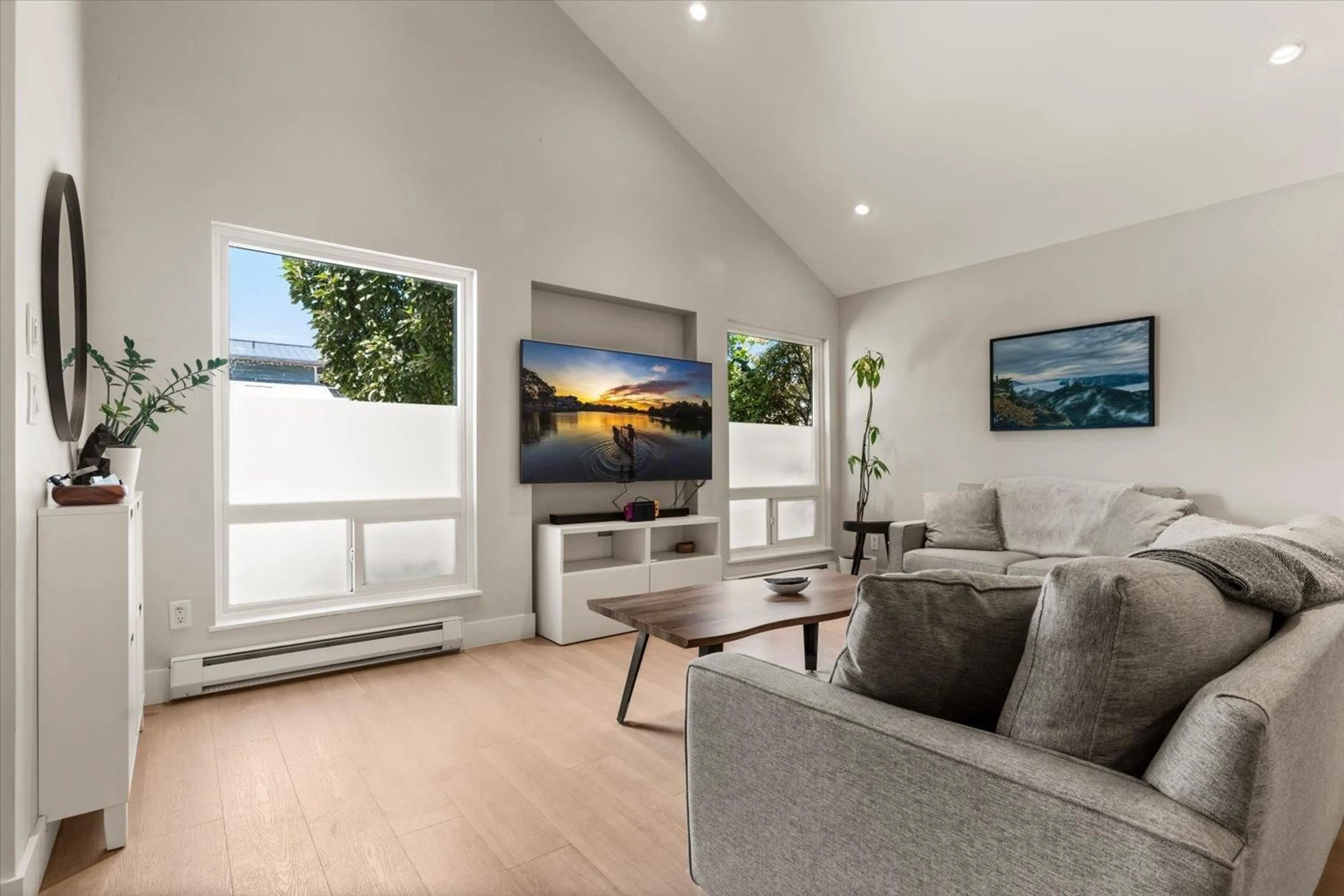 Living room with furniture, wood/laminate floor for 8562 MCCUTCHEON AVENUE, Chilliwack British Columbia V2P7K7